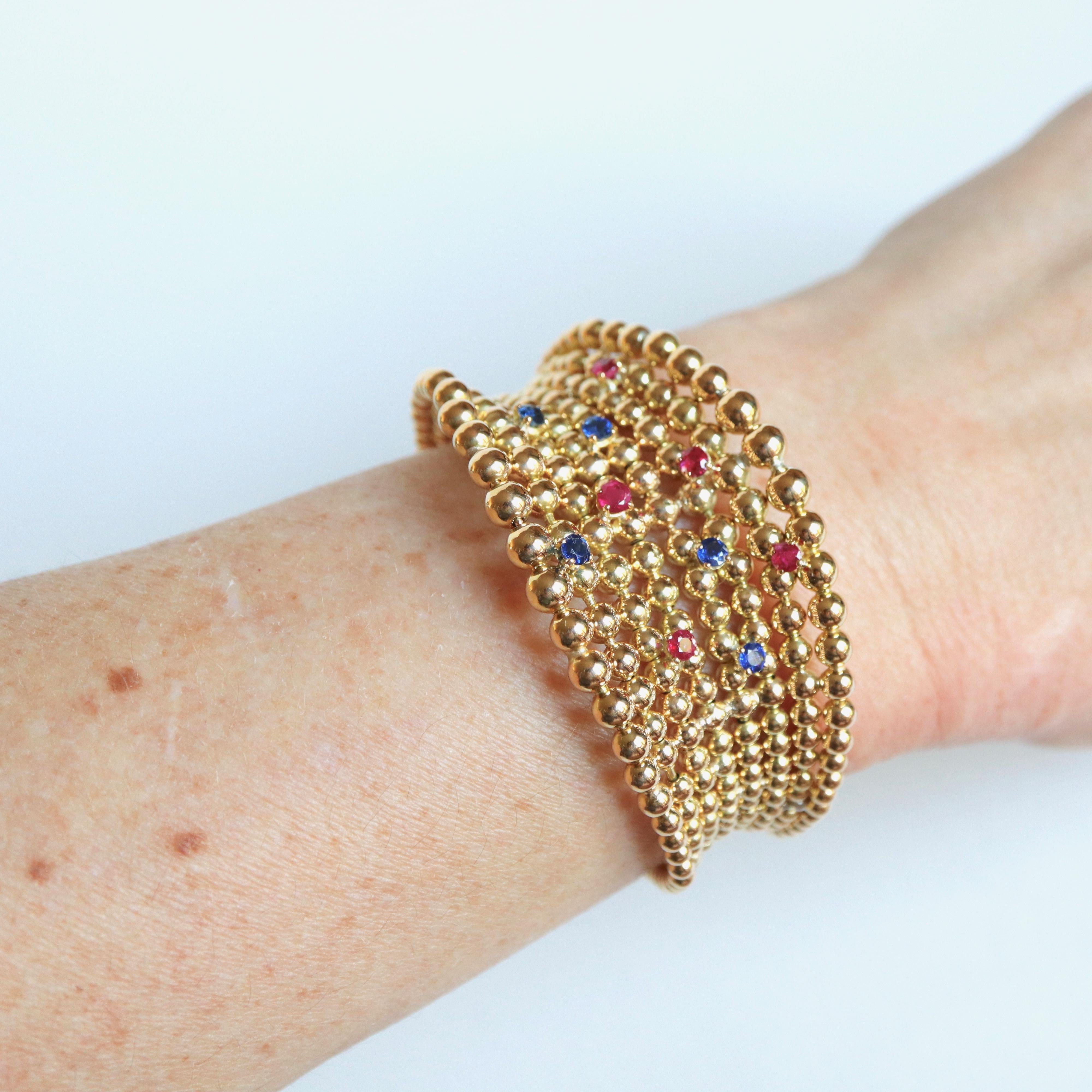 Boucheron Semi-Rigid Bracelet pearls in Yellow Gold 18 Carat Sapphires Rubies In Fair Condition For Sale In Paris, FR