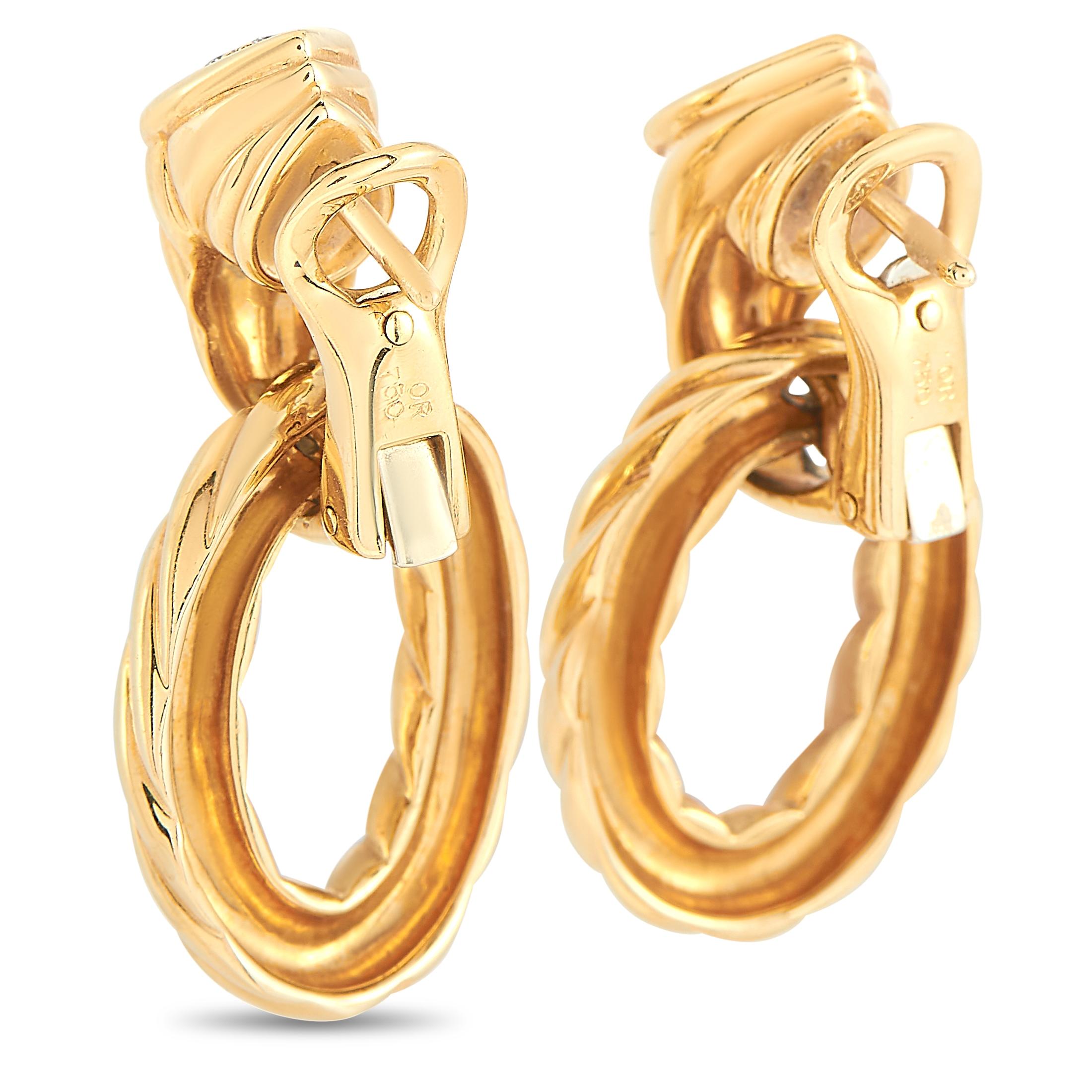 The Boucheron “Serpent” earrings are made out of 18K yellow gold and diamonds and each of the two weighs 8.25 grams. They measure 1.15” in length and 0.65” in width.
 
 The pair is offered in estate condition and includes the manufacturer’s box.