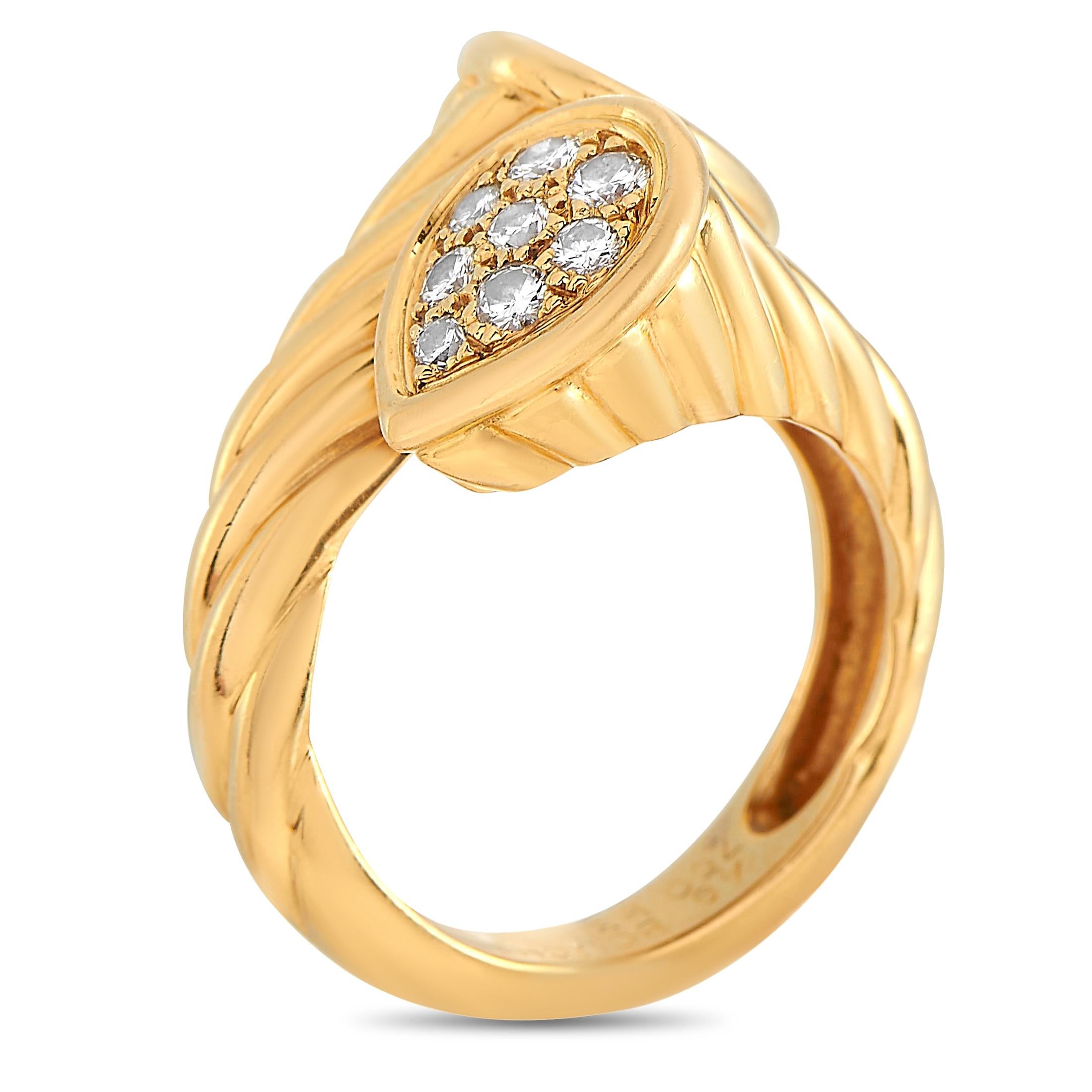 The Boucheron “Serpent” ring is made out of 18K yellow gold and diamonds and weighs 11 grams. The ring boasts band thickness of 4 mm and top height of 7 mm, while top dimensions measure 16 by 18 mm.
 
 This item is offered in estate condition and