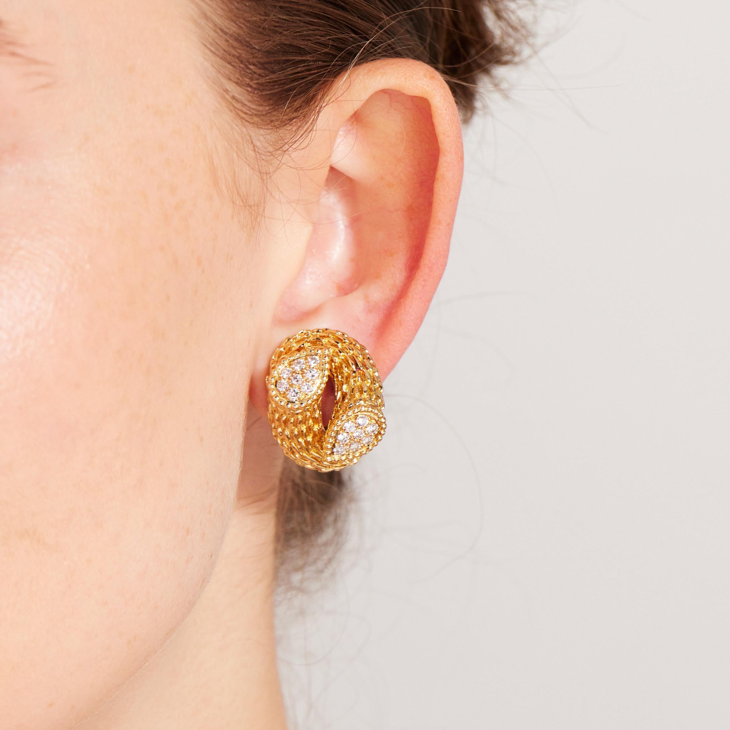 Beautifully crafted pair of Boucheron Serpent Boheme earrings in 18 karat yellow gold and featuring approximately 1.3 carats of sparkling pave-set diamonds. The Serpent Boheme collection was launched by the Paris-based jeweler in 1968 and has become