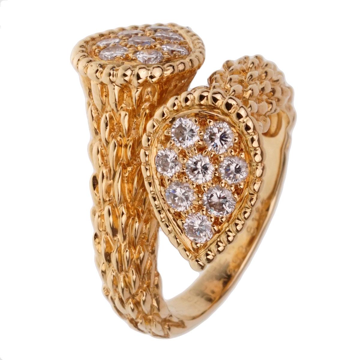 Two diamond shapes, both set with white round brilliant diamonds, are nestled together to create the serpent boheme toi et moi diamond ring from Boucheron. Adorned with beaded detail, the bands graduate from an interesting texture to smooth polish.