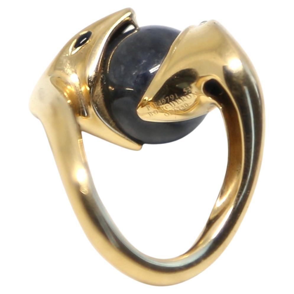 Very unusual, 18k yellow gold snake motif ring with with a black jade round bead and onyx cabochon eyes from Boucheron of Paris. Signed and numbered. Ring size is a European 53; 6 (US).Gross weight is approximately 13.9g. (approx. 1/2oz). Made in
