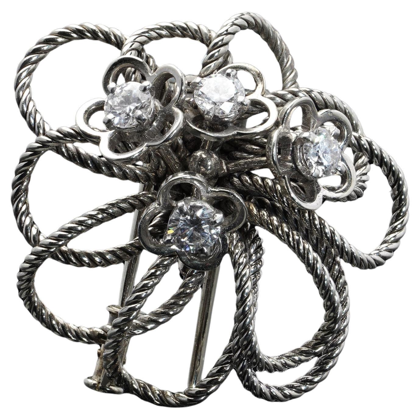 Boucheron vintage 18kt white gold diamond floral brooch, Circa 1950s