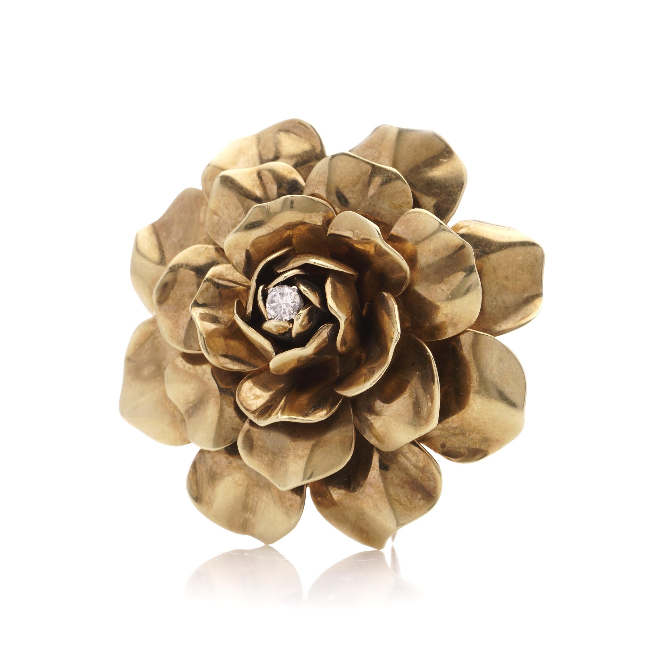 Boucheron vintage 18kt. yellow gold flower head brooch with old - European cut diamond.
Signed Boucheron, London, Date 5.51944, Initial letters L.S, pins have 19kt gold hallmarks.
Made in England, London 1944

Approx Dimensions -
Width x height: 5.5