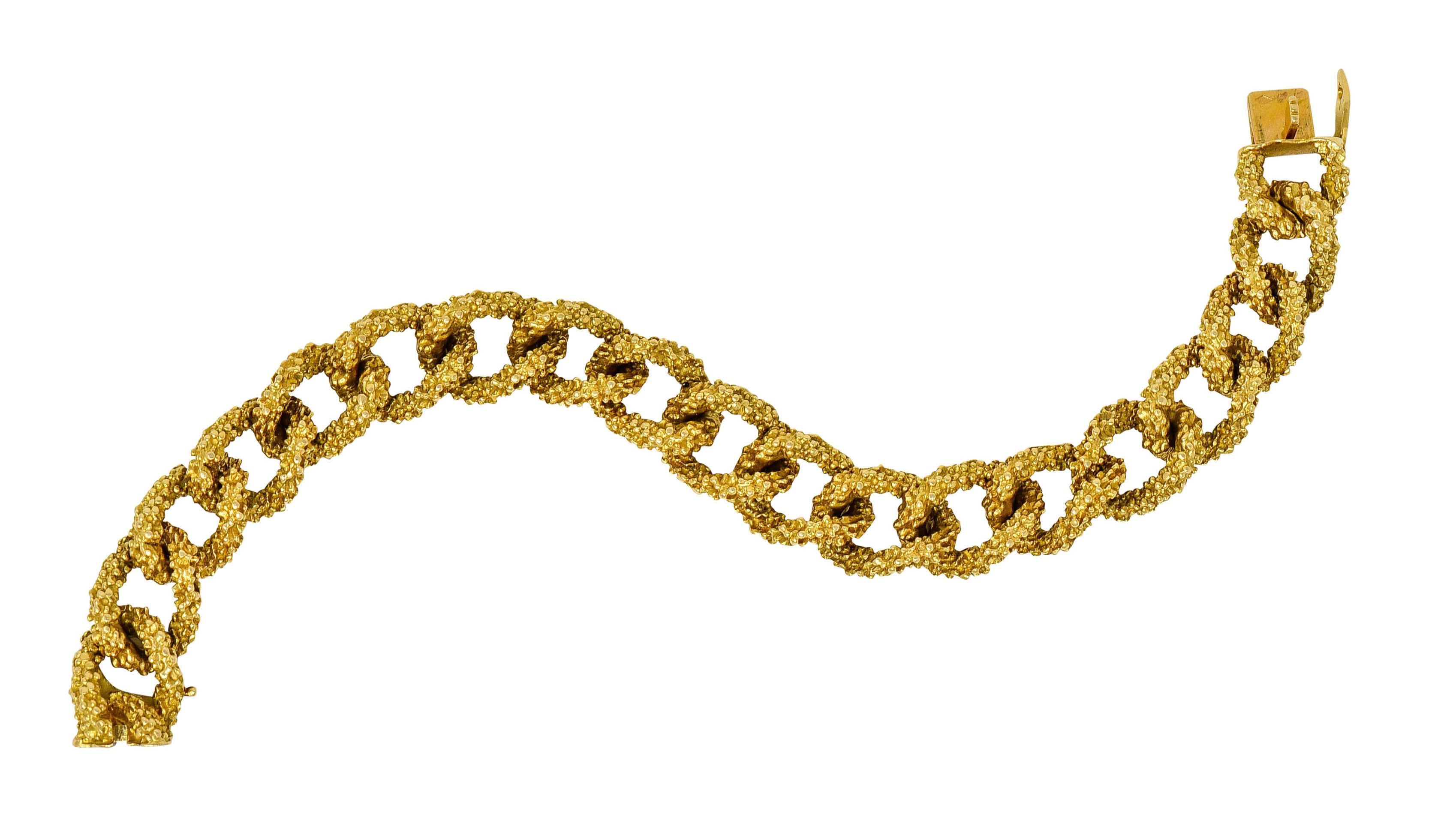 Bracelet is comprised of oversized curb links

Featuring a highly textured nugget finish

Completed by a concealed clasp and hinged safety

Fully signed Boucheron Paris with maker's mark

French assay marks for 18 karat gold

Circa: 1960s

Length: 7