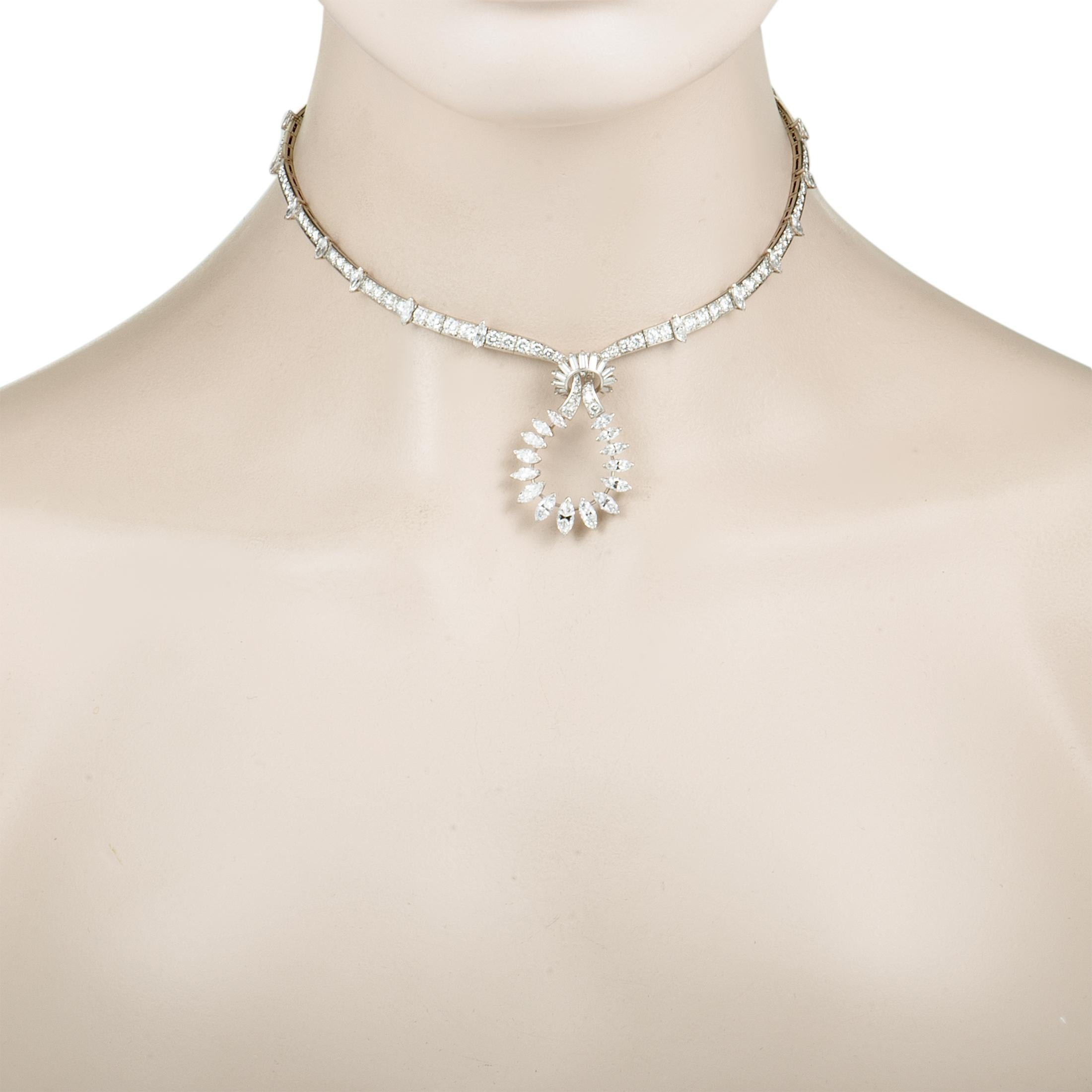 Embodying the very essence of refined extravagance, this wonderful Boucheron necklace will add a splendidly sophisticated touch to any ensemble of yours. This vintage piece is exquisitely crafted from prestigious platinum and it is decorated with a
