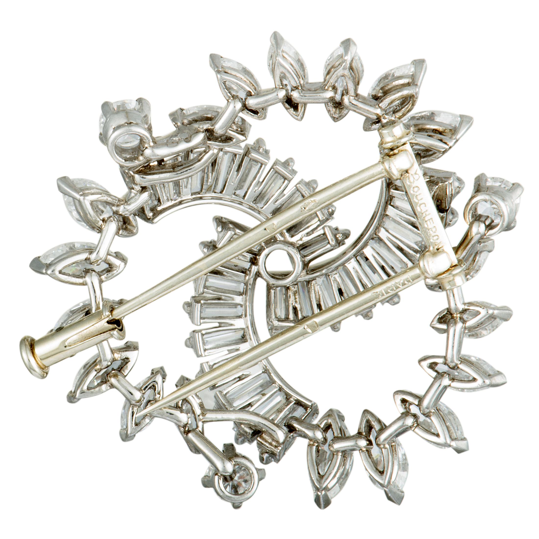 Elevate your style in a most extravagant manner with this fascinating vintage piece that is splendidly designed by Boucheron and wonderfully crafted from luxurious platinum. The brooch is embellished with a plethora of expertly cut, colorless (grade