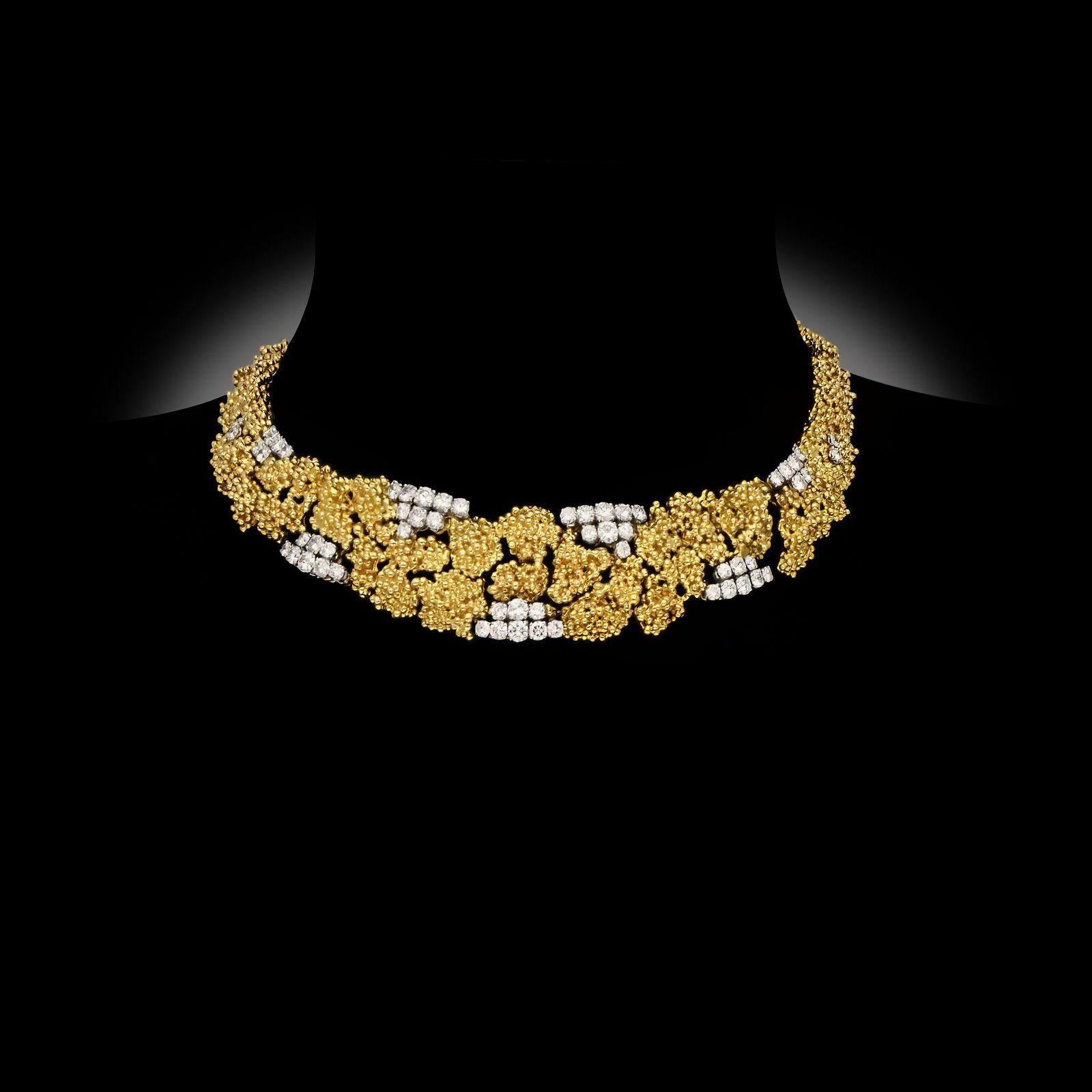 Creatore:
Boucheron
Sommario:
Una collana d'epoca in oro giallo 18 ct e diamanti a granulazione
Descrizione:
Collana vintage in oro giallo 18ct e diamanti di André Vassort per Boucheron Paris, circa 1960. Realizzato con granulazione d'oro in un