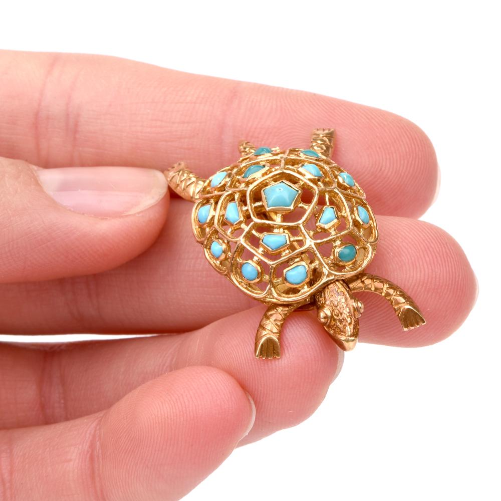 This vintage Boucheron highly collectible turtle pin brooch is crafted in 18K yellow gold. Turtles shell features gold open work design with 16 bezel set rare Persian turquoise. Legs, arms and head show scale texture and move to both the left and