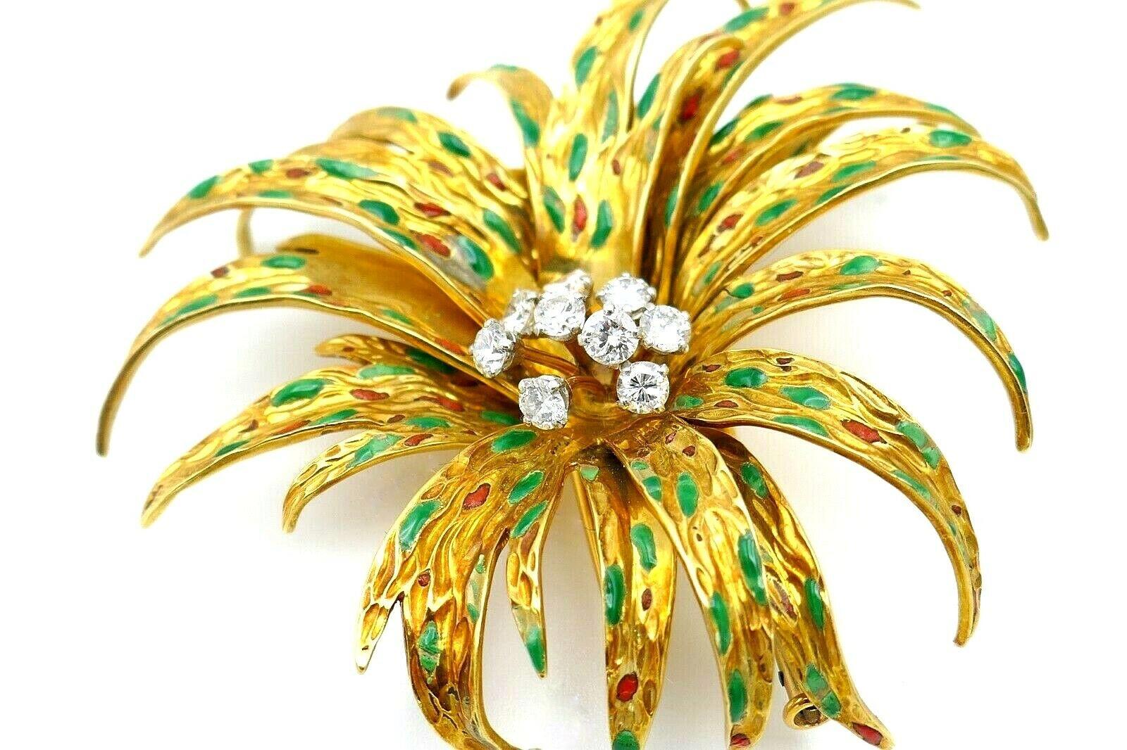 Gorgeous vintage flower brooch made of 18k yellow gold by Boucheron (Paris). Featuring diamond and enamel accents.  Diamonds are round brilliant cut, total weight is 0.90 points. 
Stamped with Boucheron maker's mark, a hallmark for 18k gold and a