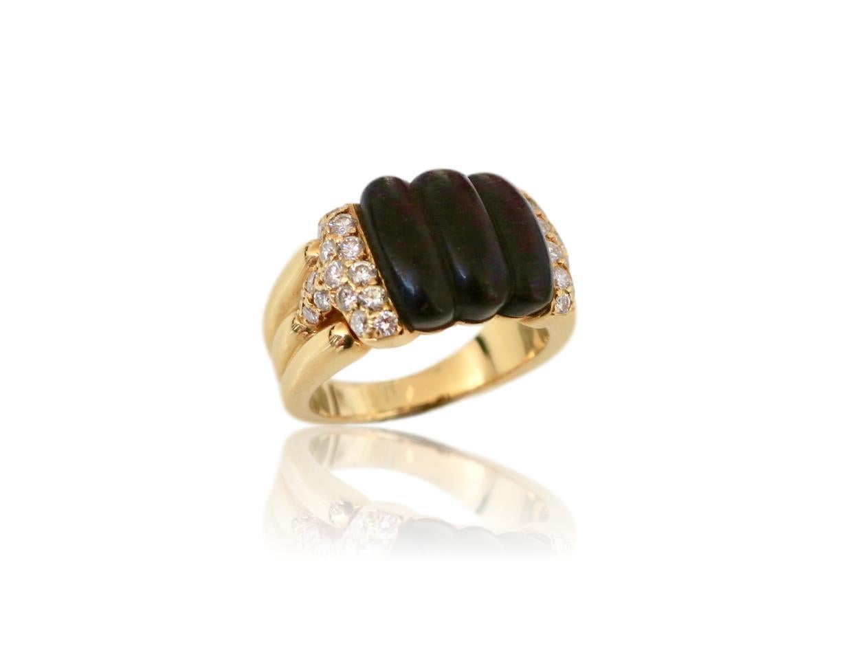 Wood and diamond ring by French designer Boucheron. The 3/8