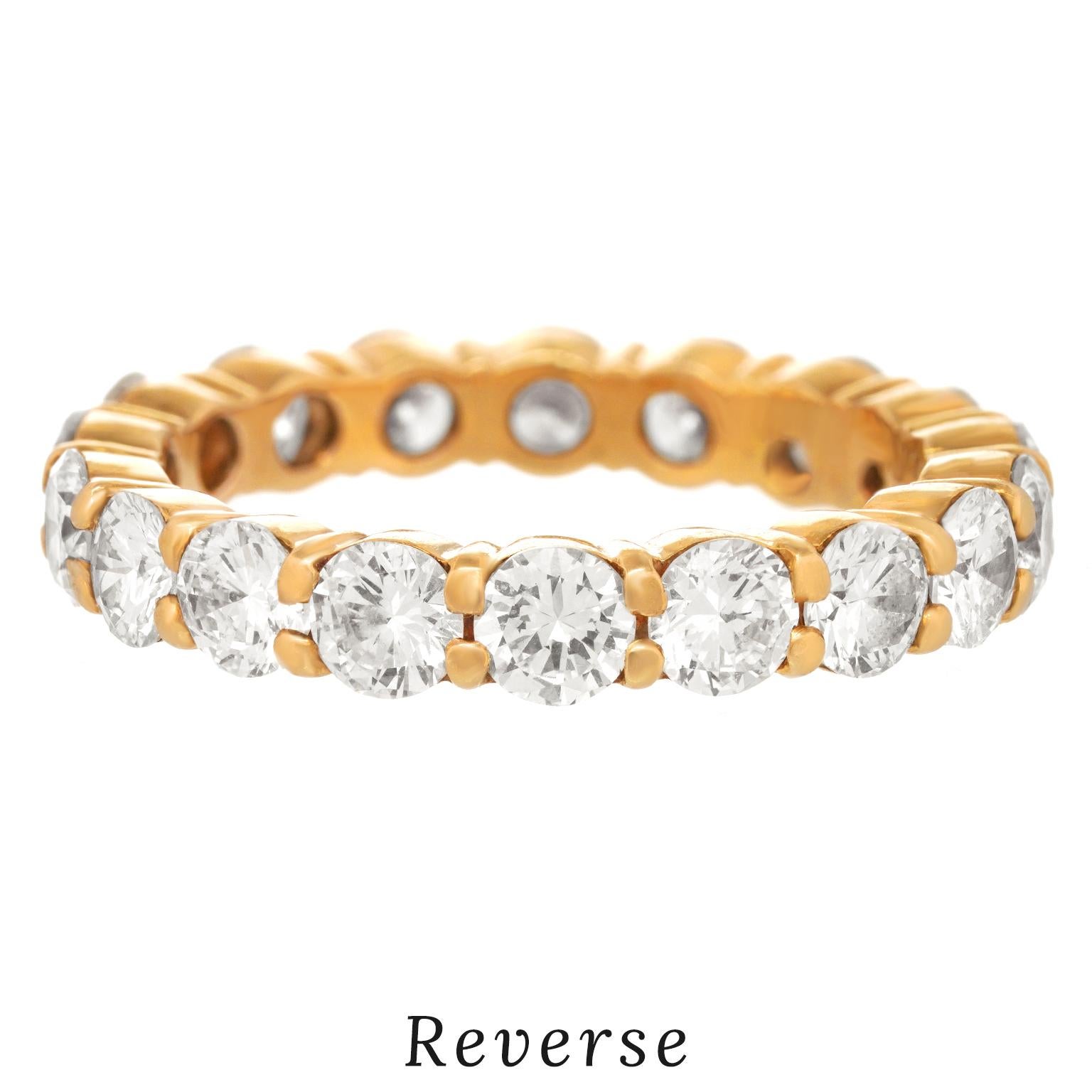 Circa 1960s, 18k, by Boucheron, France.  Set with 2.25 carats of superb white diamonds (G color, VS2 clarity), this Boucheron eternity band set the sixties on fire.  Radiating luxury without ostentation (so French!), it is elegantly stylish.