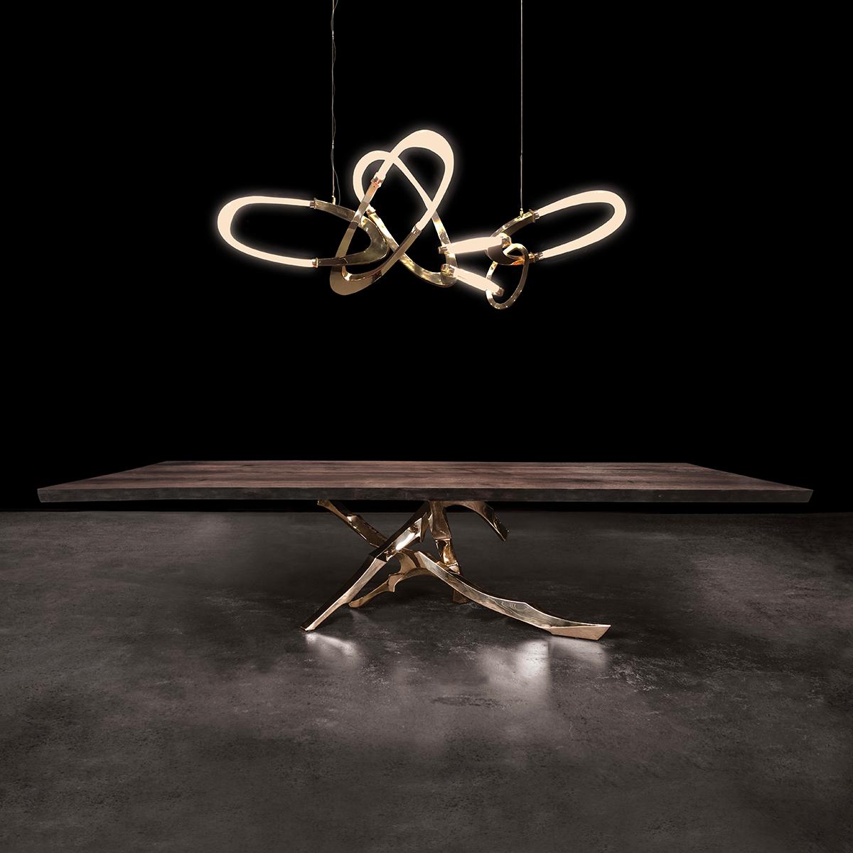 European Bouchon Chandelier: Interlocked Circular Sculptural Elements of Bronze and Glass For Sale