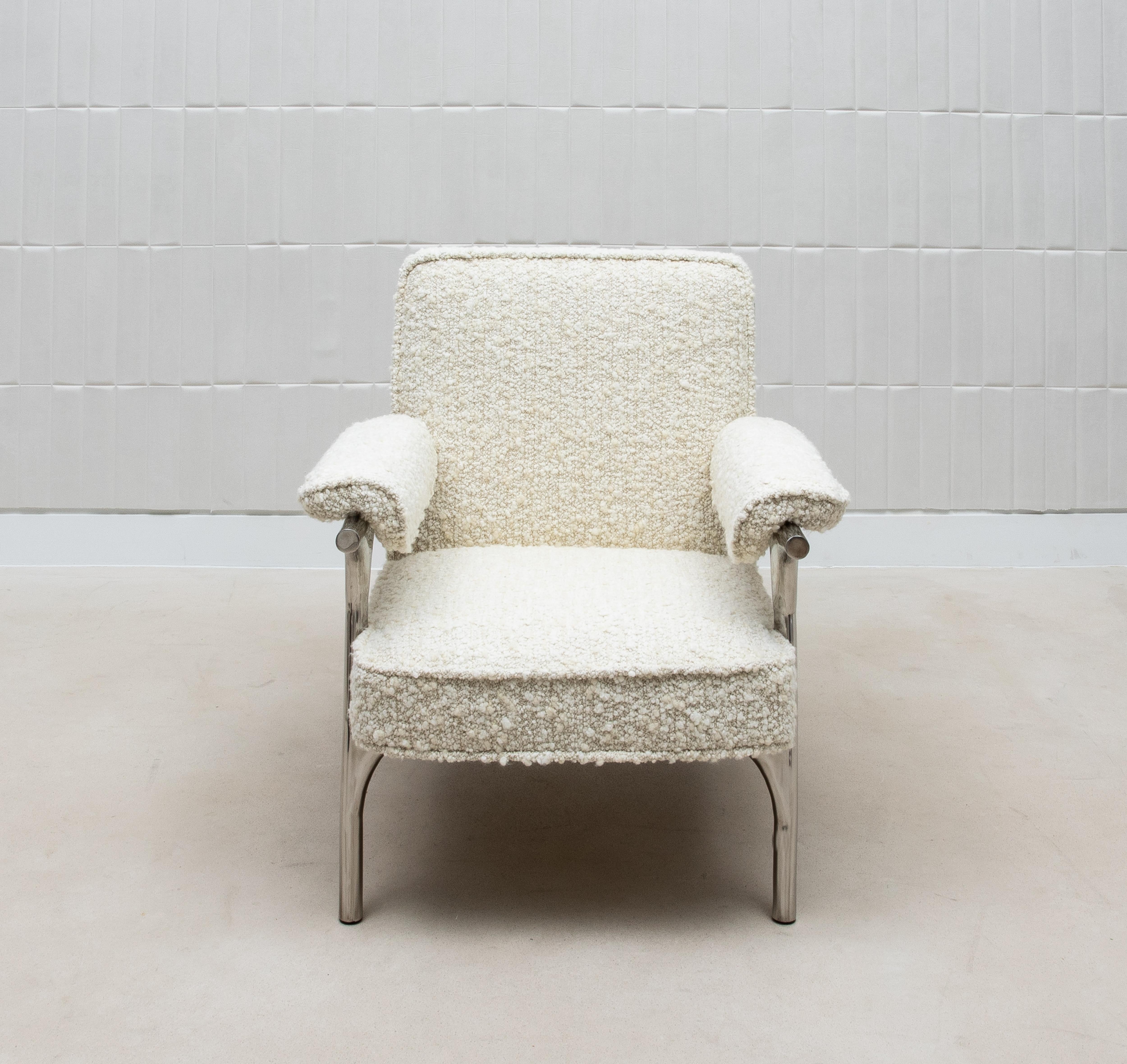 The Ramo Armchair by R&Y Augousti is a stunning showcase of modern luxury, where comfort meets sophisticated design. Upholstered in plush cream bouclé, these pieces exude a cozy elegance that invites relaxation while adding a refined touch to any