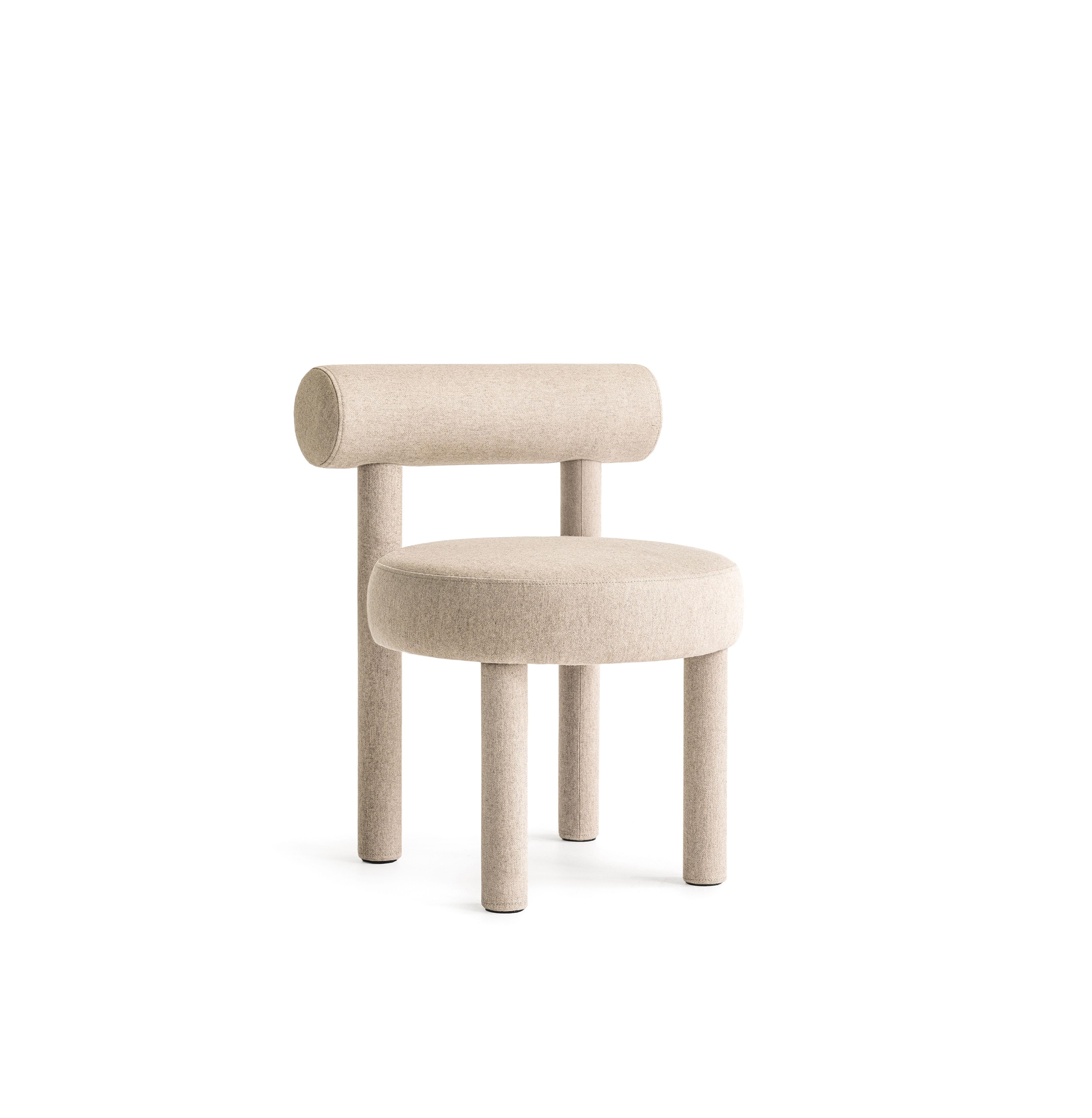 Kvadrat Zero/ JAB Boucle Gropius chair CS1 by NOOM
Dimensions: 57cm x 57cm x H 74cm 
Materials: Wood, foam rubber, injection-molded soft foam. 
Also available in other materials.

The New NOOM furniture collection is dedicated to the 100th
