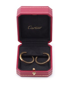 Lanière earrings by Cartier in 18 karats gold