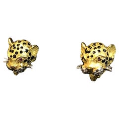 Vintage Boucles d'oreilles clip Léopards, en or jaune 18 carats diamants et rubis