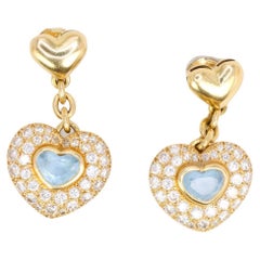 Heart-shaped pendant earrings in gold, diamonds and aquamarine