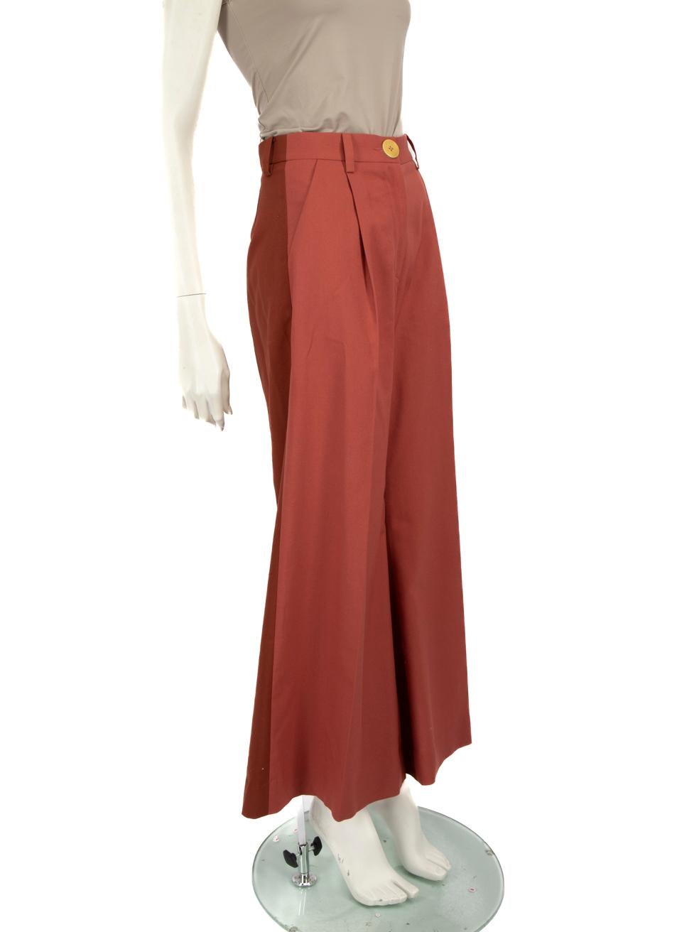 CONDITION is Very good. Hardly any visible wear to the trousers is evident on this used Bouguessa designer resale item.
 
 
 
 Details
 
 
 Brown
 
 Polyester
 
 Trousers
 
 Wide leg
 
 Brown two tone panels
 
 2x Side pockets
 
 Fly zip and button