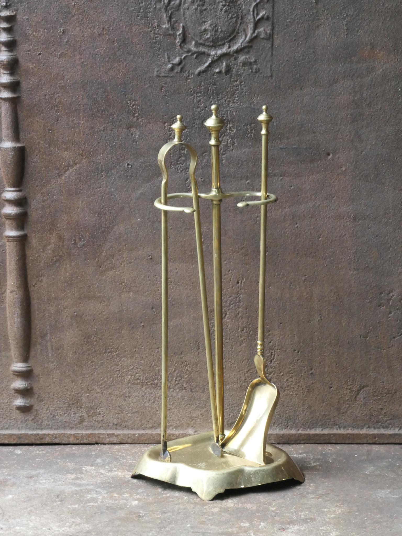 19th century French Napoleon III fireplace tool set - fire irons made of brass. Bouhon Frères were prominent French producers of fireplace tools in the 19th century. The firm participated in the 1878 and 1900 Paris Expositions Universelles. The