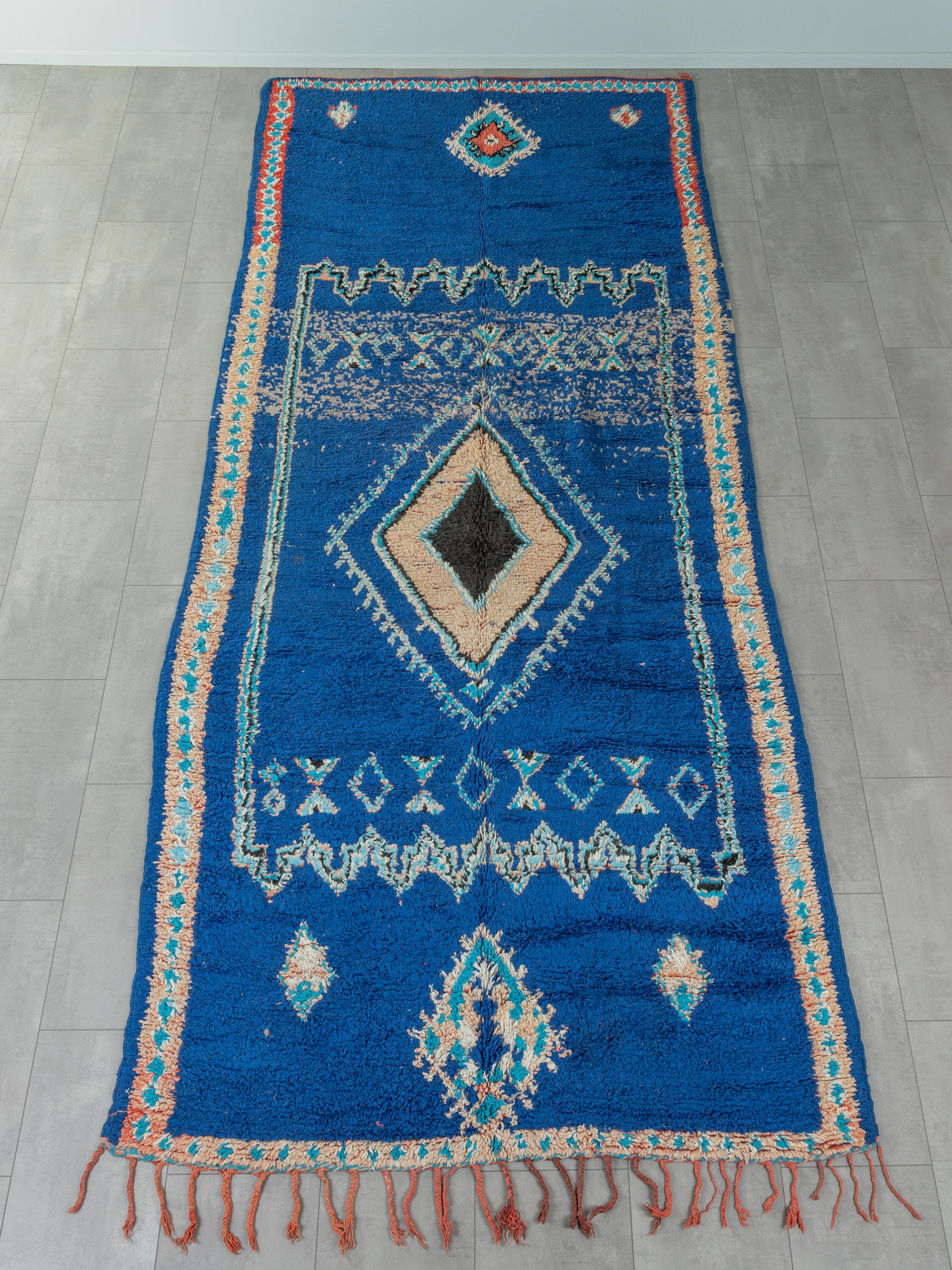 This Vintage Boujad is a 100 % wool rug – soft and comfortable underfoot. Our Berber rugs are handmade, one knot at a time. Each of our Berber rugs is a long-lasting one-of-a-kind piece, created in a sustainable manner with local wool. 

Vintage