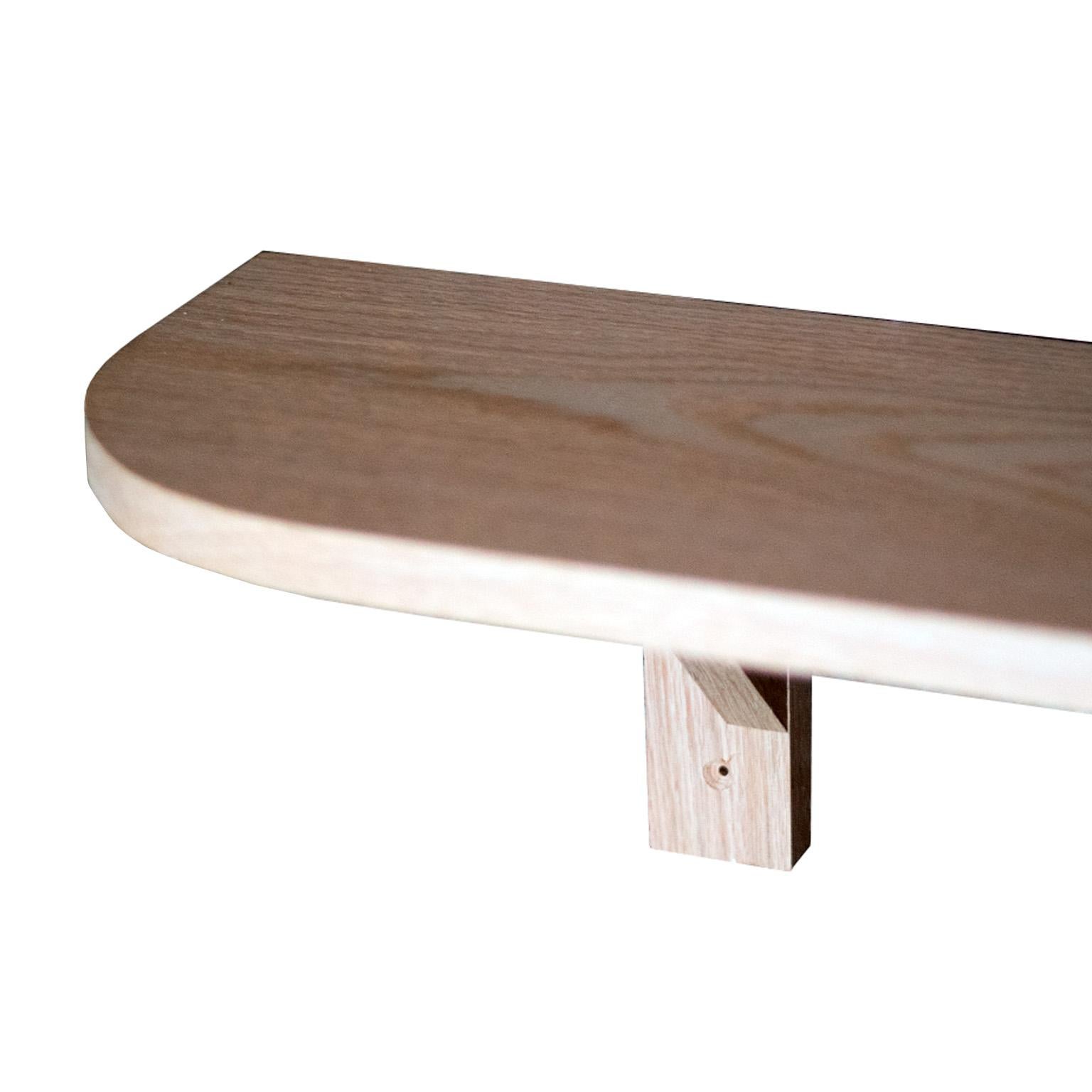 The Boulangerie shelf is made from solid red oak with matching brackets, finished in bees wax.  Customers can specify length and wood species.  

