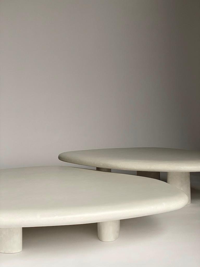 Handcrafted Anamorphous Asymmetric Low Coffee Table with Natural Italian Lime Plaster Stucco Gesso Finish, off white light colour, silky semi-glossy finish.

THE OBJECT

The BOULDER series consists of anamorphous and asymmetric forms by duo Domenic