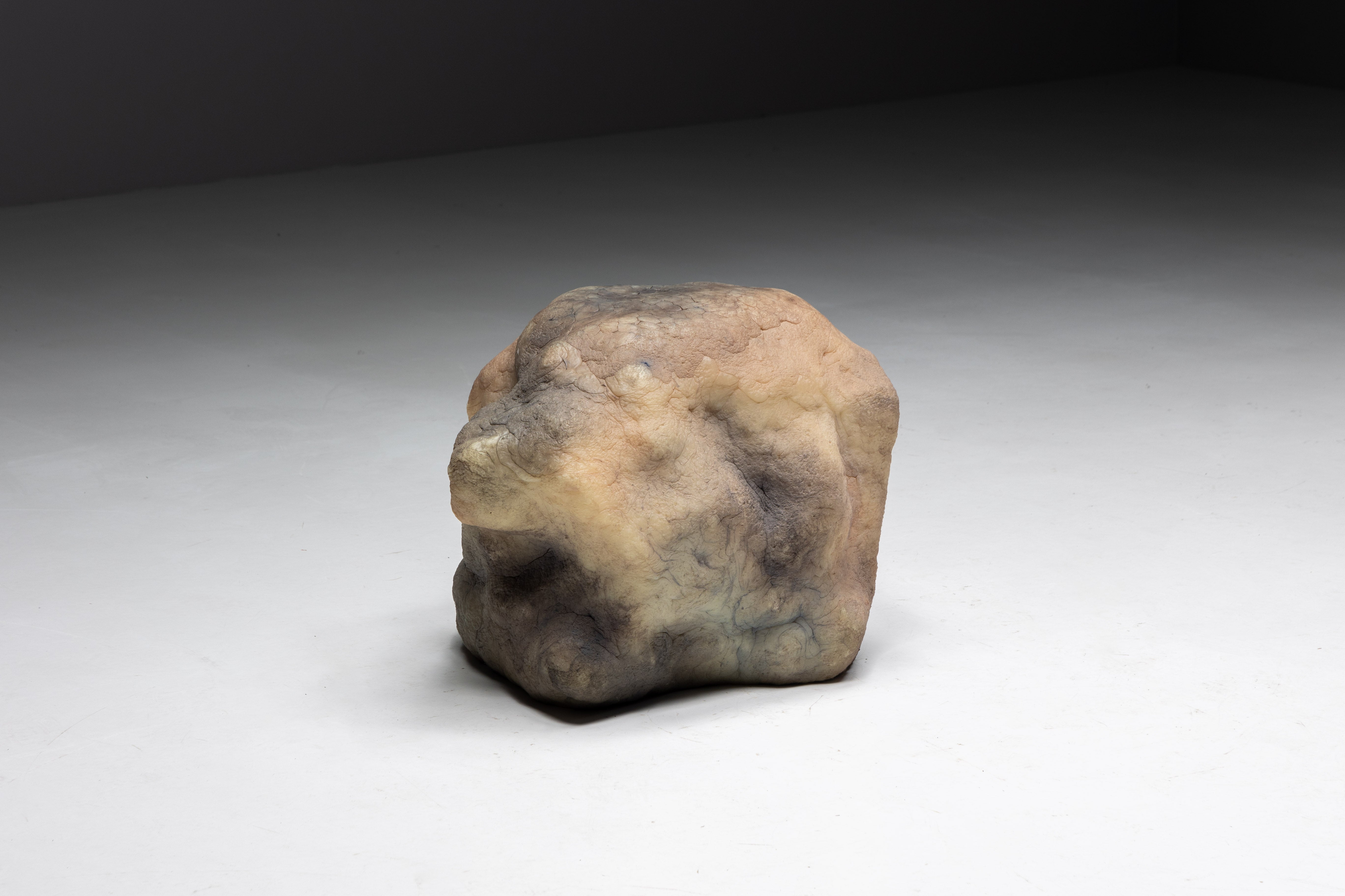 Elissa Lacoste's 'I Dream of Megalithic Times' series: Boulder Footstool, 2019. Composed of various speleothem-like shapes emerging from silicone skins infused with earthly pigments. This collection of functional art pieces challenges conventional