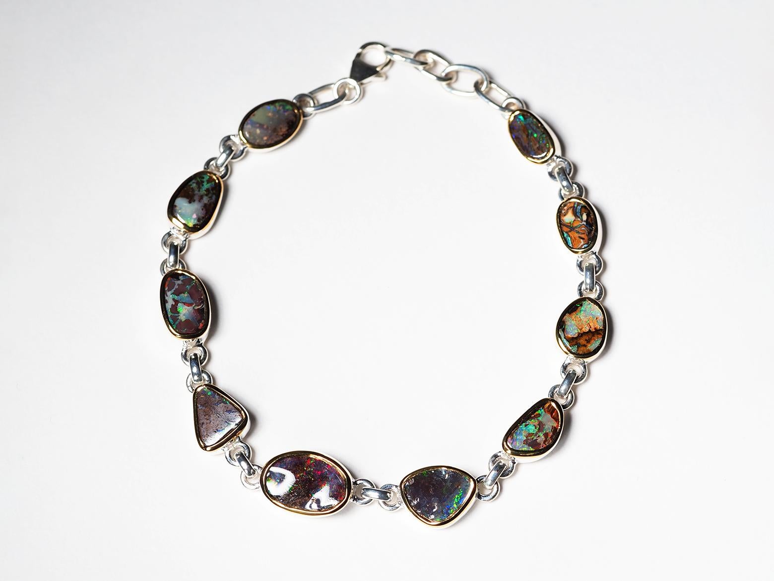 Silver bracelet with 10 natural Boulder Opals
Opals origin - Australia
weight of the bracelet - 9.4 grams
bracelet length is adjustable - 6.69 - 7.28 in / 17 - 18.5 cm
stones measurements - from 0.19 x 0.27 in to 0.31 x 0.39 in / from 5 х 7 mm to 8