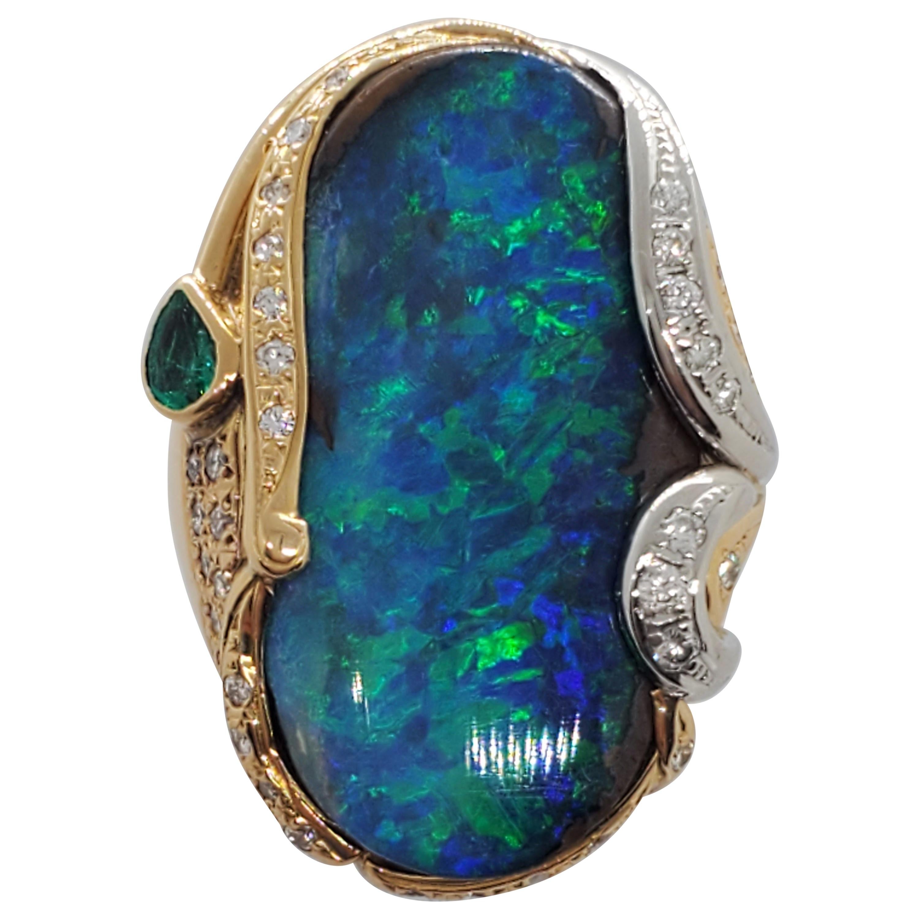 Boulder Opal Cabochon, Emerald, and White Diamond Ring in 18 Karat Gold