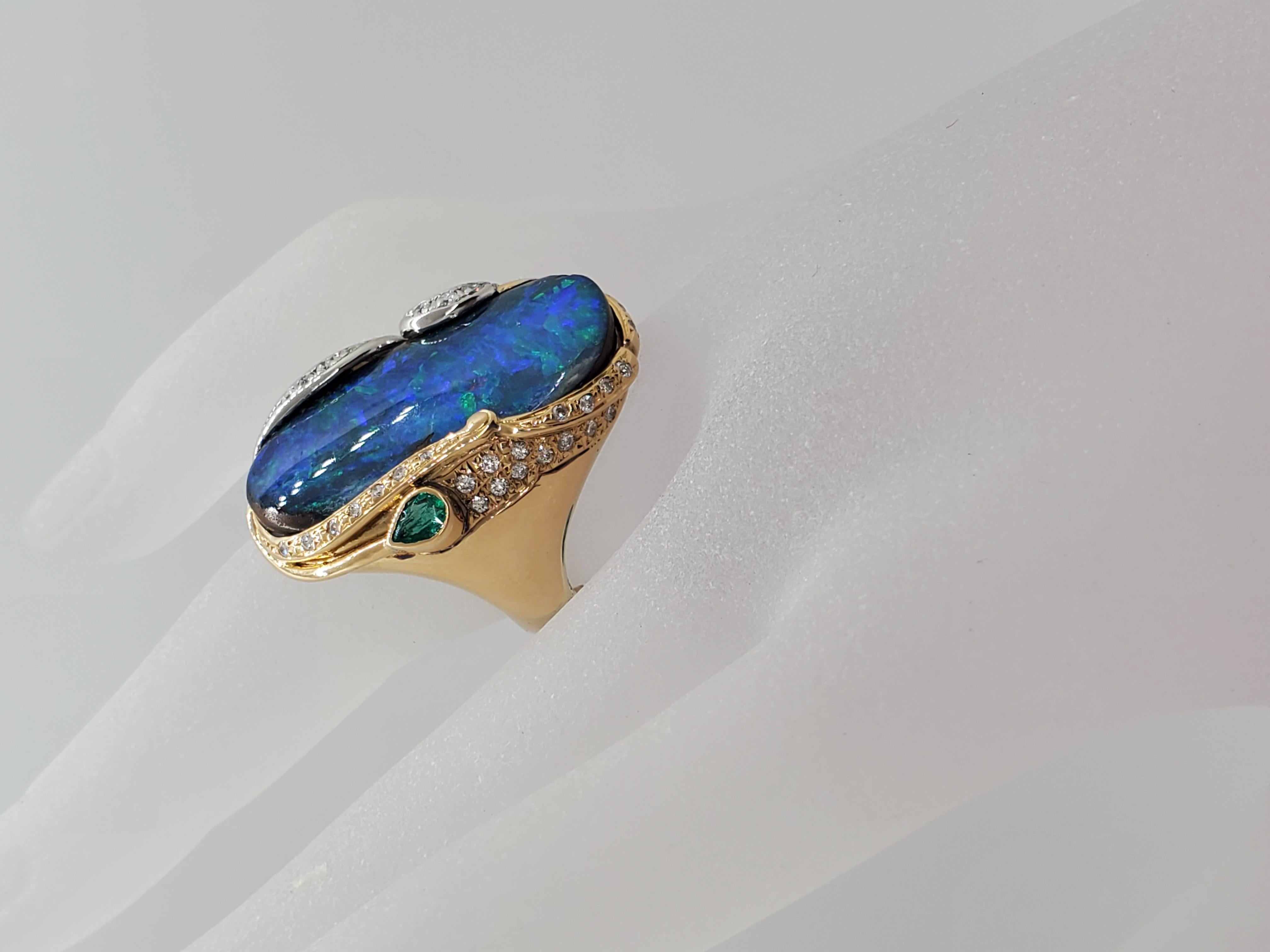 Emerald Cut Boulder Opal Cabochon, Emerald, and White Diamond Ring in 18 Karat Gold