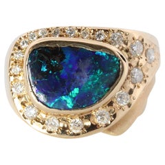 Anello con diamante Opale Boulder. Anello con diamante opale autentico in oro 18k.