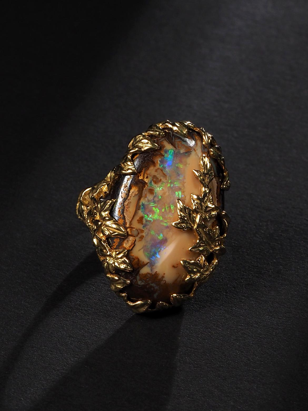Ivy ring with Boulder Opal in 18K yellow gold
opal origin - Australia
opal measurements - 0.71 х 1.06 in / 18 х 27 mm
gemstone weight - 14.95 carats
ring size - 8.5 US - 58 EU
ring weight - 14.7 grams

Ivy collection


We ship our jewelry worldwide