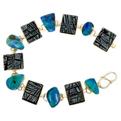 Boulder-Opal-Gliederarmband mit Meteorit und 22-karätigem sowie 18-karätigem Gold „Botschaften der Götter“