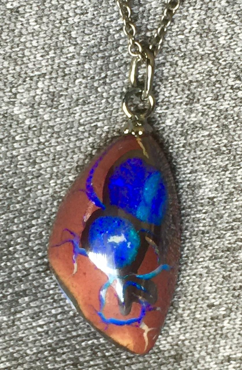 A Boulder Opal Pendant on a Blackened Silver 18