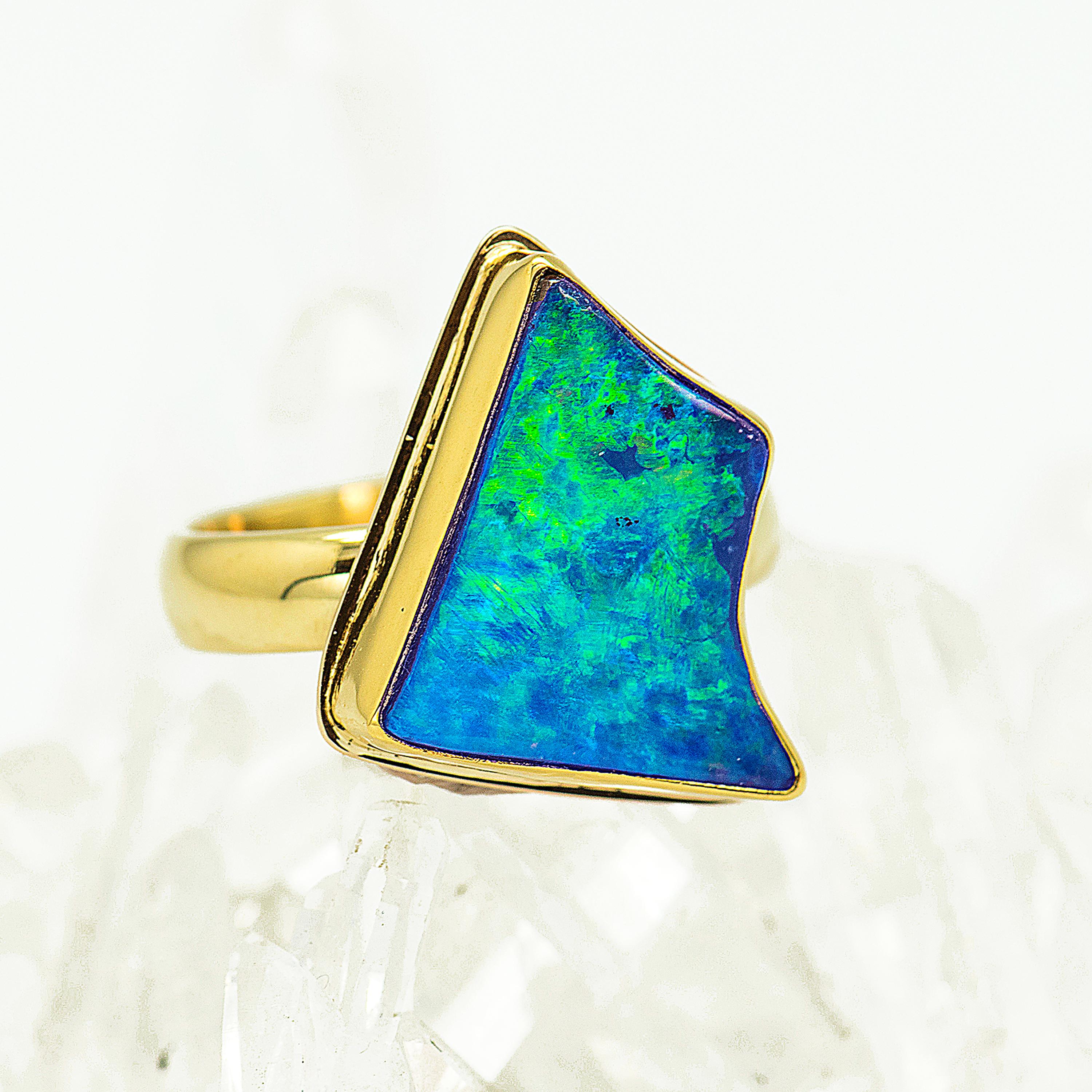 Boulder opal ring in 22k and 18k gold. The green color and flash in this boulder opal is stunning and the shape, so unique. I’m having a hard time not keeping this ring for myself. Boulder opal comes from Queensland, Australia, this particular gem