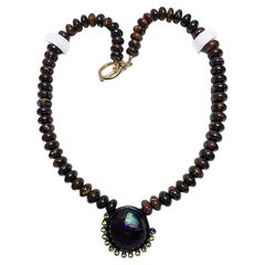 Boulder Opal, Sapphire and Tsavorite Pendant on a Beaded Boulder Opal Necklace.
