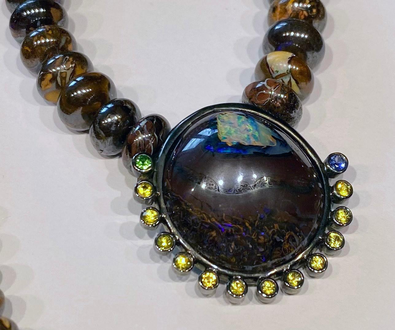 Cabochon Boulder Opal, Sapphire and Tsavorite Pendant on a Beaded Boulder Opal Necklace. For Sale
