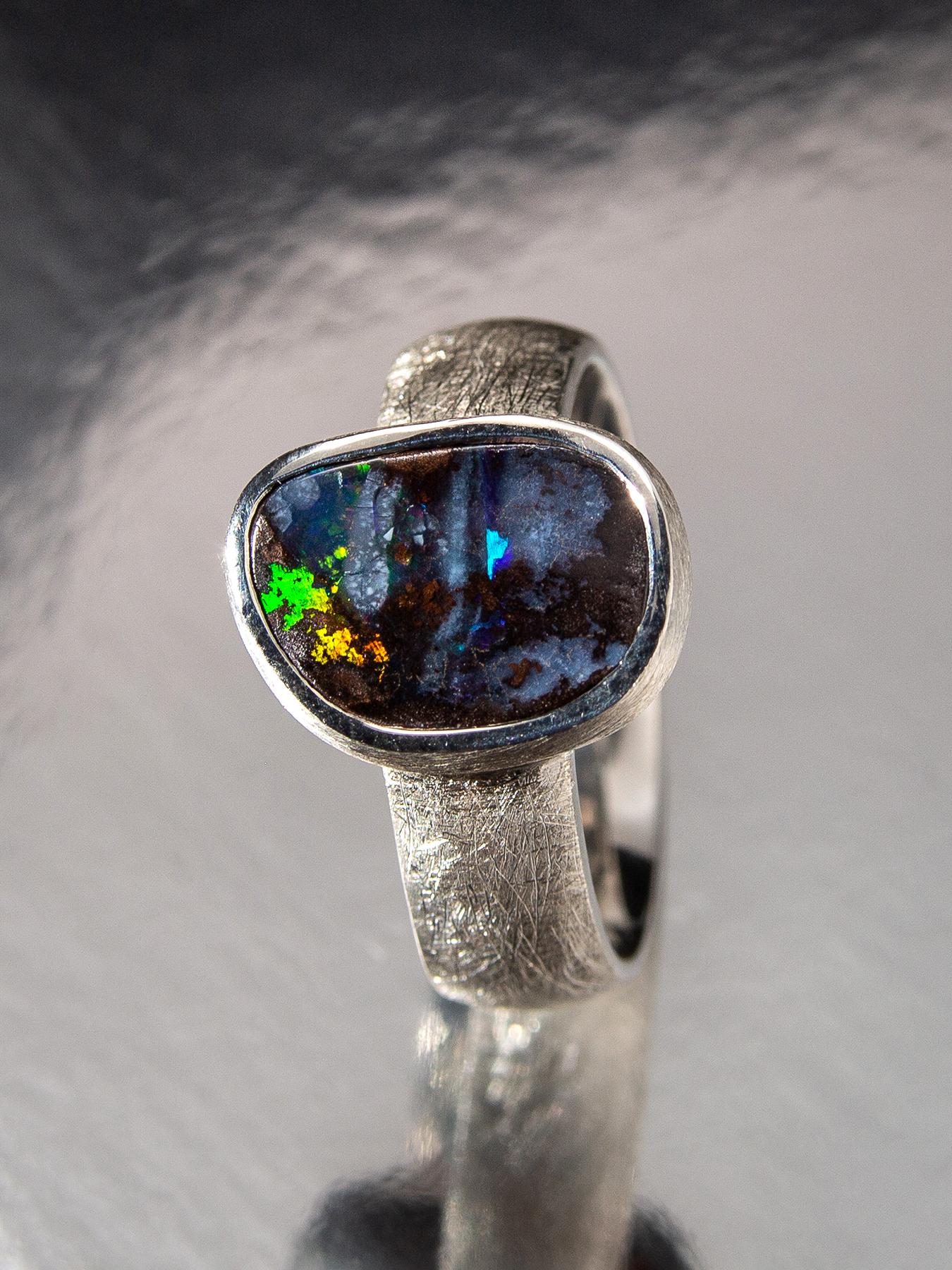 Scratched sterling silver ring with natural Boulder Opal
opal origin - Australia
stone measurements - 0.35 x 0.47 in / 9 x 12 mm
stone weight - 5 carats
ring weight - 7 grams
ring size - 8.5 US