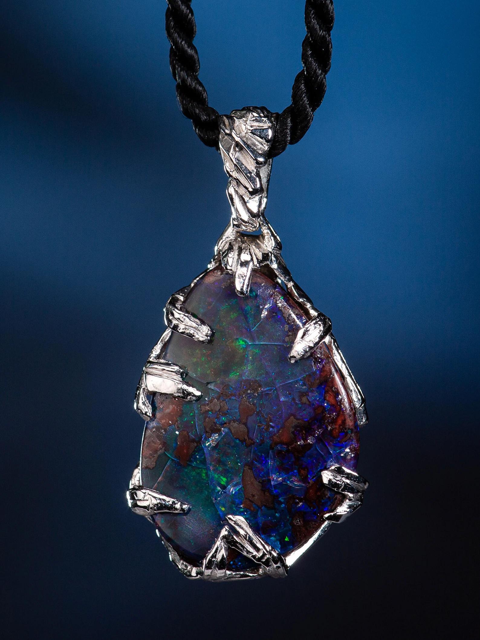 Silver pendant with Boulder Opal 
gemstone origin - Australia
opal measurements - 0.2 x 0.59 x 0.79 in / 5 х 15 х 20 mm
opal weight - 12.40 carats
pendant length - 1.3 in / 33 mm
pendant  weight - 4.86 grams