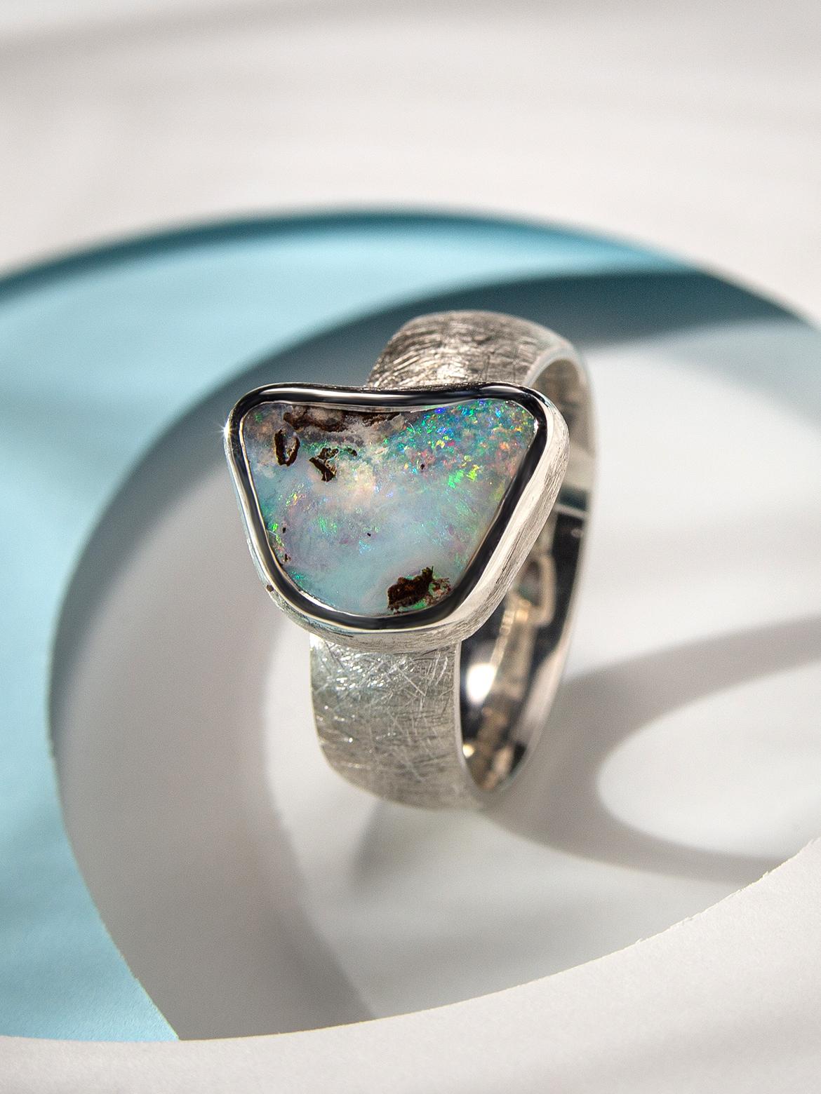 Scratched sterling silver ring with natural Boulder Opal
opal origin - Australia
opal measurements - 0.35 х 0.51 in / 9 х 13 mm
opal weight - 5.3 carats
ring weight - 8.5 grams
ring size - 8.75 US

ref No om0821

