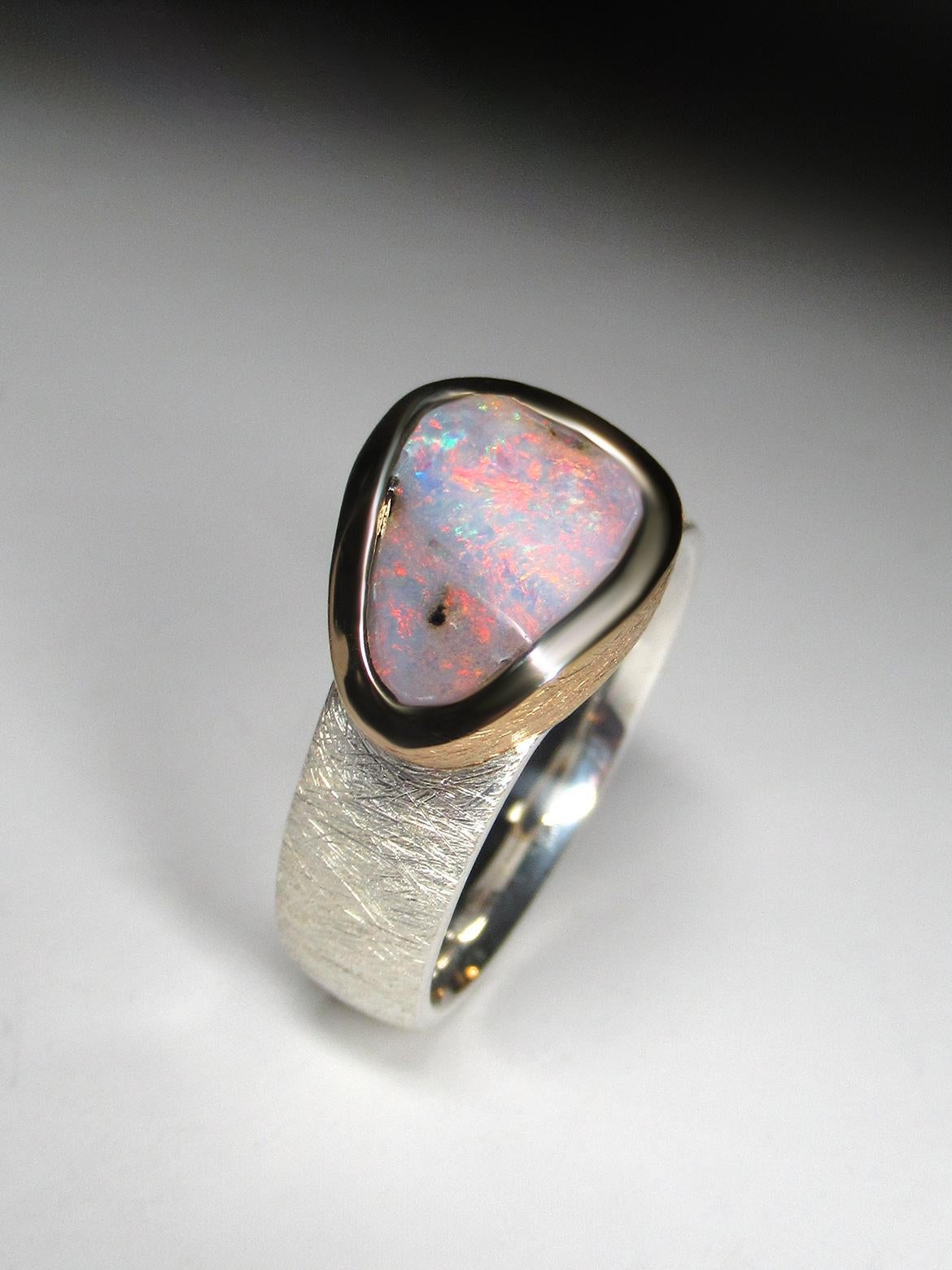 18K gold plated silver ring with natural free form shape Boulder Opal
Opal gemstone origin - Australia 
opal measurements  - 0.31 x 0.47 in / 8 х 12 mm
ring weight - 7.6 grams
ring size - 8 1/4 US
ref No 2452

Worldwide shipping from Berlin,