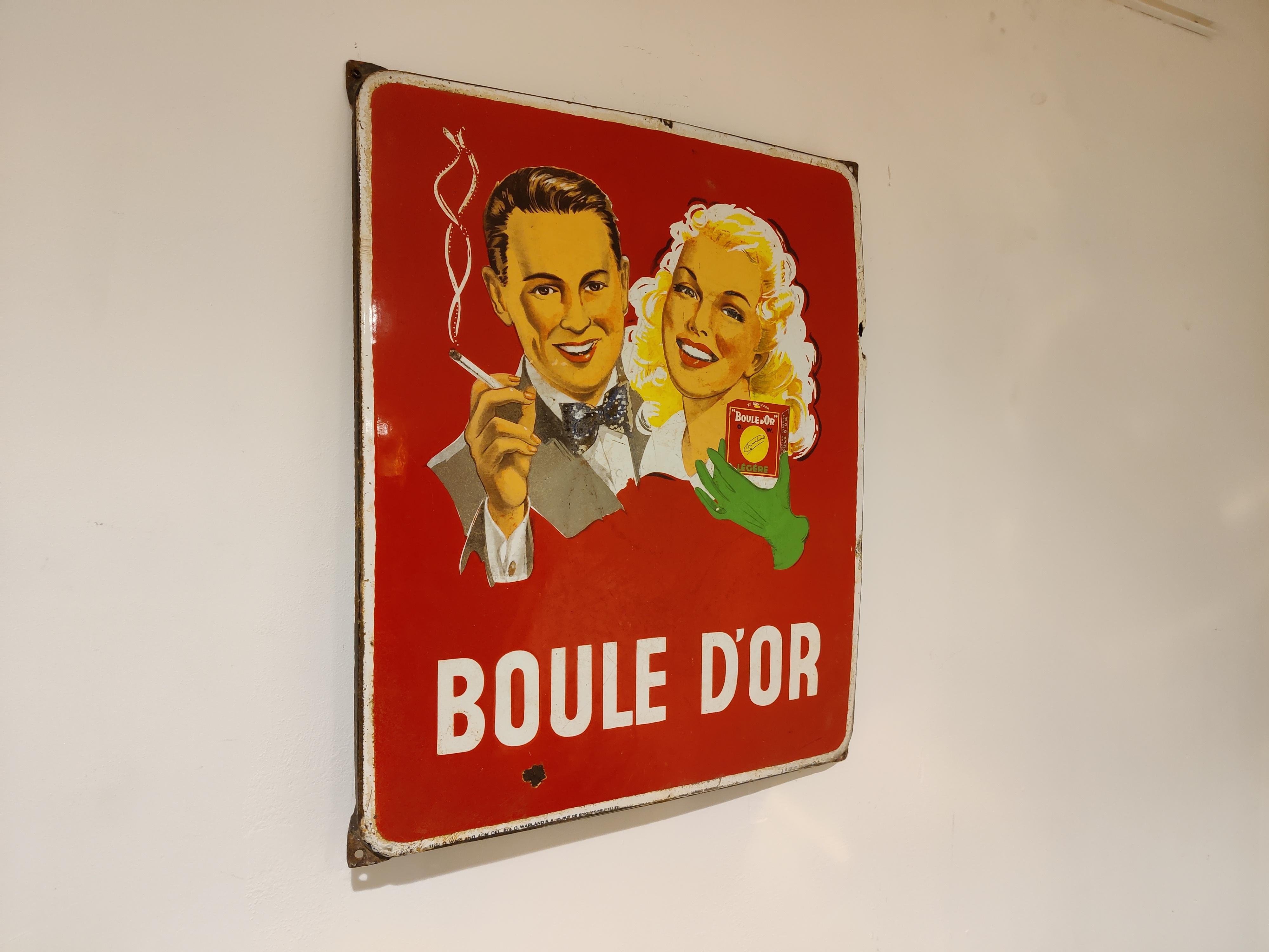 Charming enamel publicity sign by Boule d'or.

Dated 1953

All 4 holes are intact, so can be hung without problems.

Normal age related wear to the panel, nothing has been refurbished.

Measures: Height: 66cm/25.98