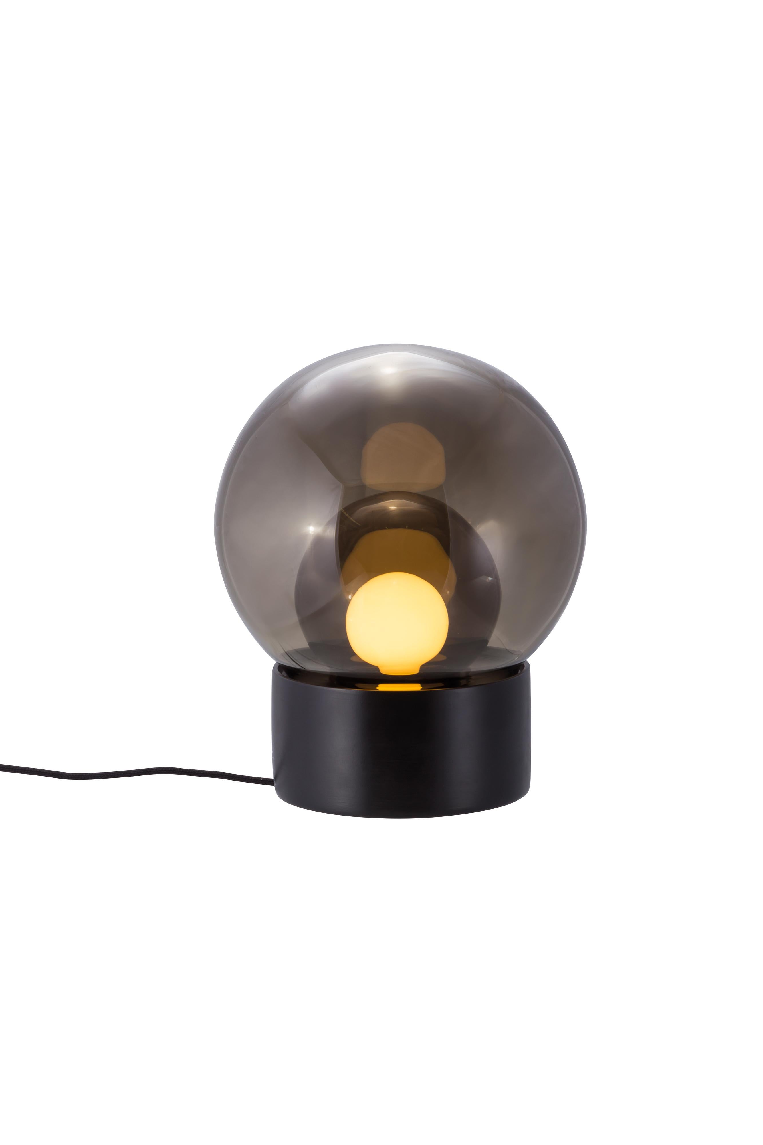 Boule Small Smoky Grey Smoky Grey Black Table Lamp by Pulpo
Dimensions: D29 x H35.5 cm
Materials: ceramic, handblown glass, coloured, textile.

Also available in different finishes: transparent  opal white black,  transparent  smoky grey black,