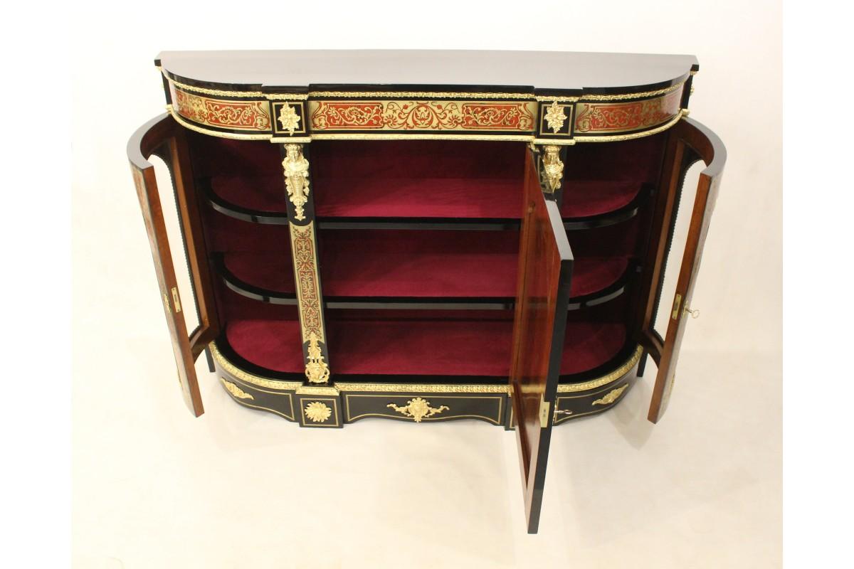 A beautiful unique Boulle style chest of drawers, made in France around 1860.

Richly decorated with gilding and brass ornaments.

The chest of drawers is professionally renovated, inside lined with red velvet material.

dimensions: height 113 cm