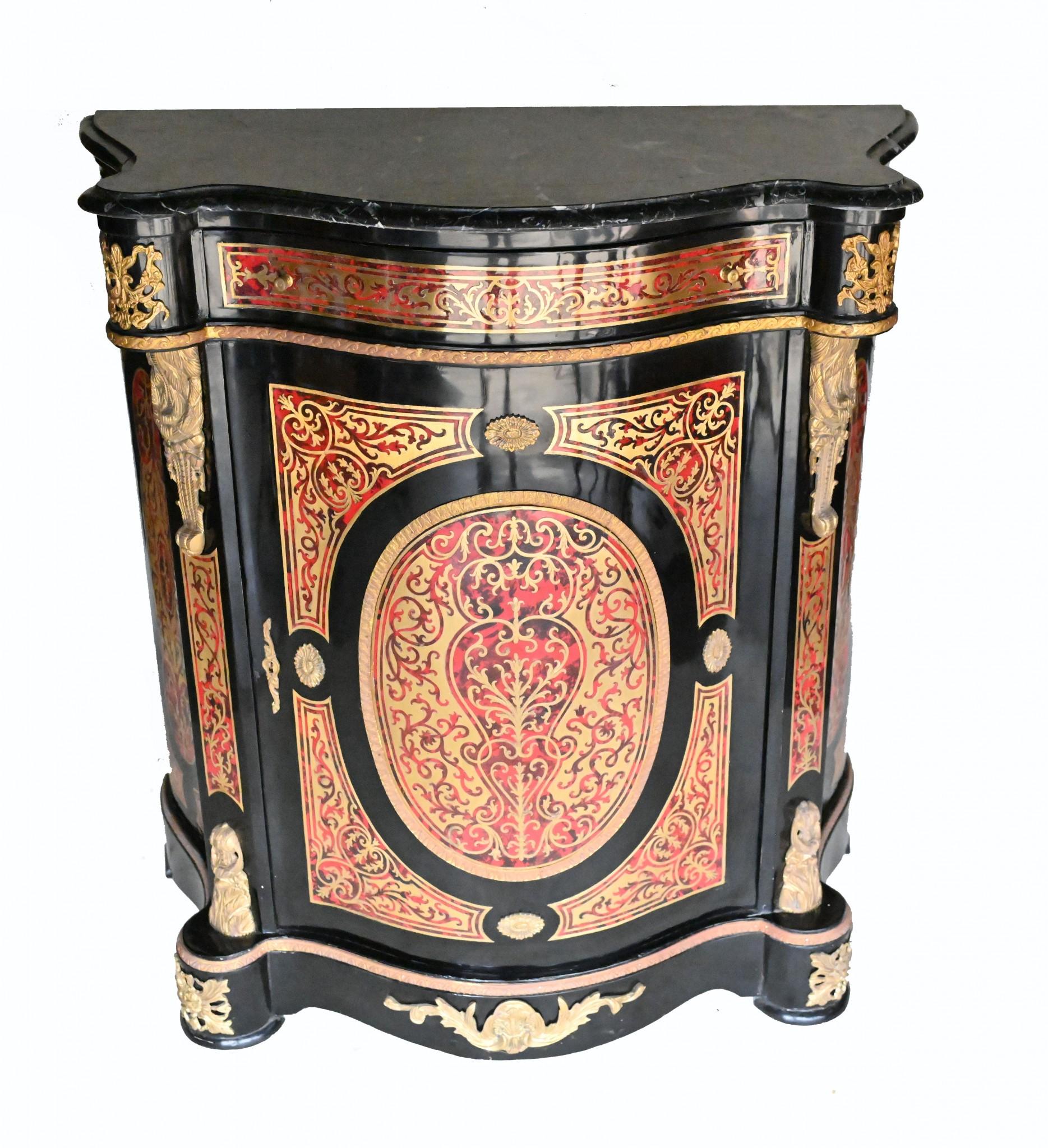 Stunning single French Boulle style inlay cabinet
Typical Boulle inlay with the hand cut brass over the ebony and faux tortoiseshell
Such a classic look, Charles Andre Boulle was the furniture maker of choice to Louis XVI
We also carry other pieces