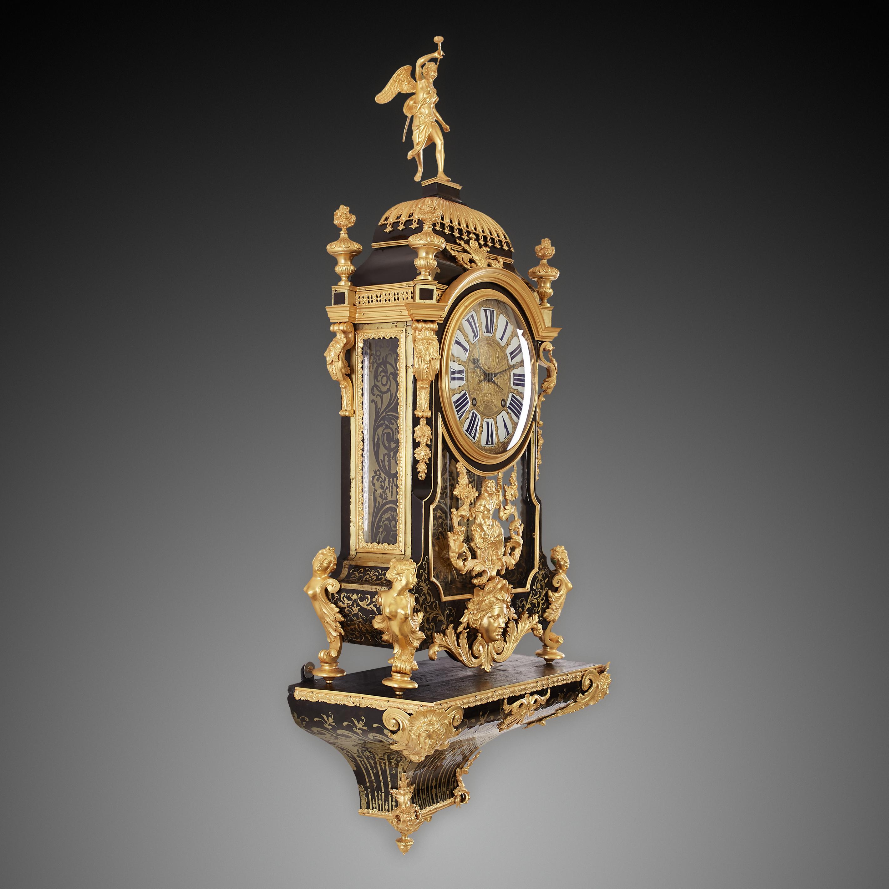 A large French gilt bronze bracket clock – symbolizing the triumphant song of the Louis XIV

You will discover the full Baroque style of the reign of King Louis XIV through this large French Gilt bronze ebony marquetry bracket clock. The inner