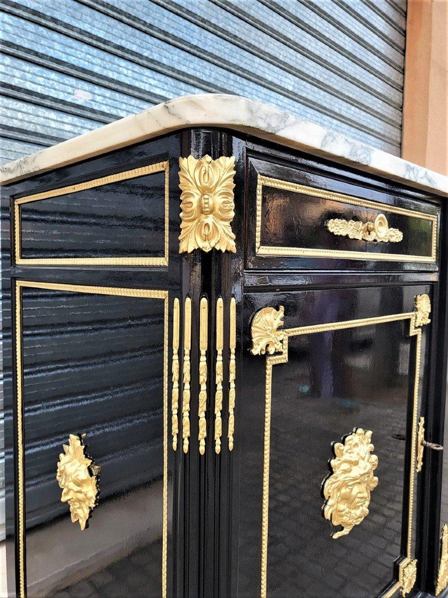 Very Large long Buffet Sideboard Credenza cabinet with 4 Doors in Napoleon III Boulle Style.
Rare as such a large buffet cabinet in oak  veneered ebony with rich ornamentation of gilded bronzes with ingot molds, keyholes, asparagus, masks on the