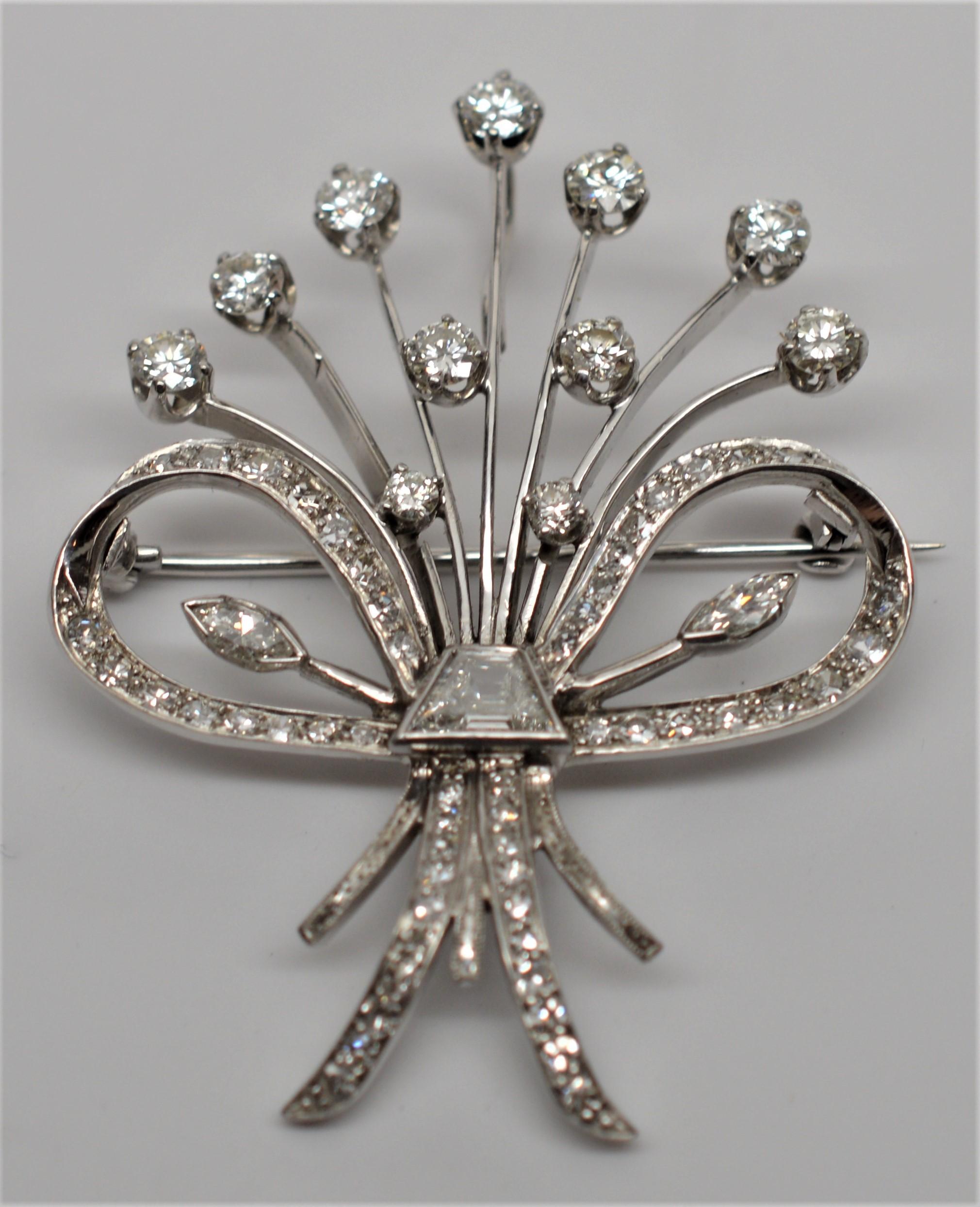  Bouquet of Diamonds 18 Karat White Gold Pin Pendant. Timeless American Twentieth Century  piece . Eleven Diamond buds 