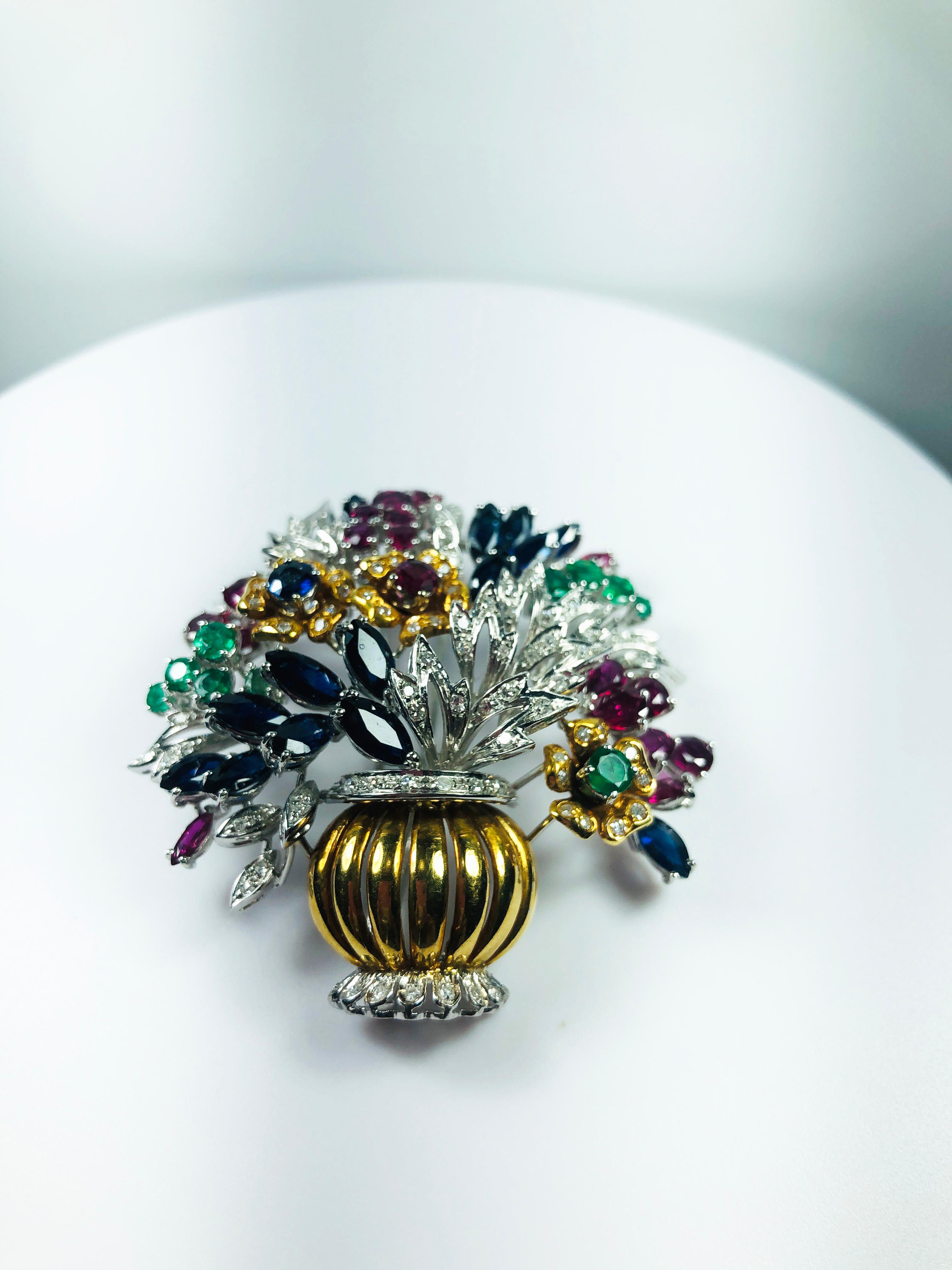 Bouquet of flower Brooche in 18k yellow and white gold, with diamonds,  emerald, ruby and sapphire composing a beautiful flowers

MATERIALS
◘ Weight 29,6 grams 
◘ Size 55cm /22inch. 

READY TO SHIP
*Shipment of this piece is not affected by